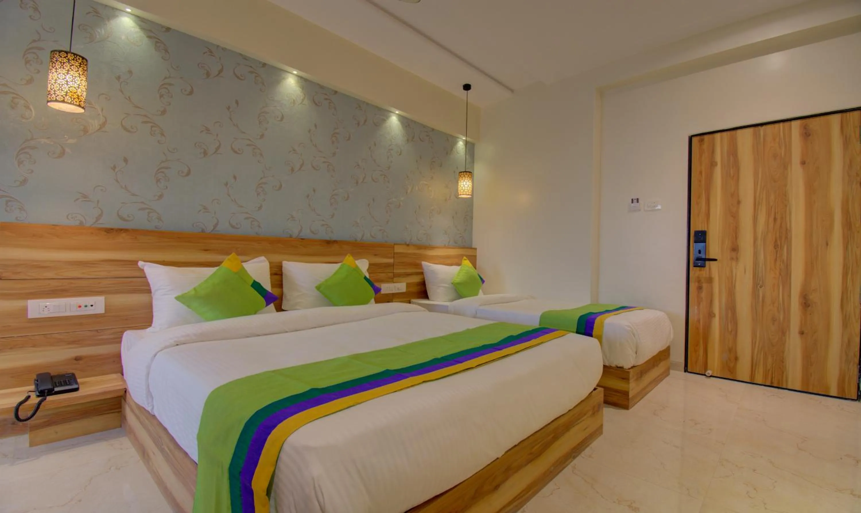 Bed in Hotel Amisha International