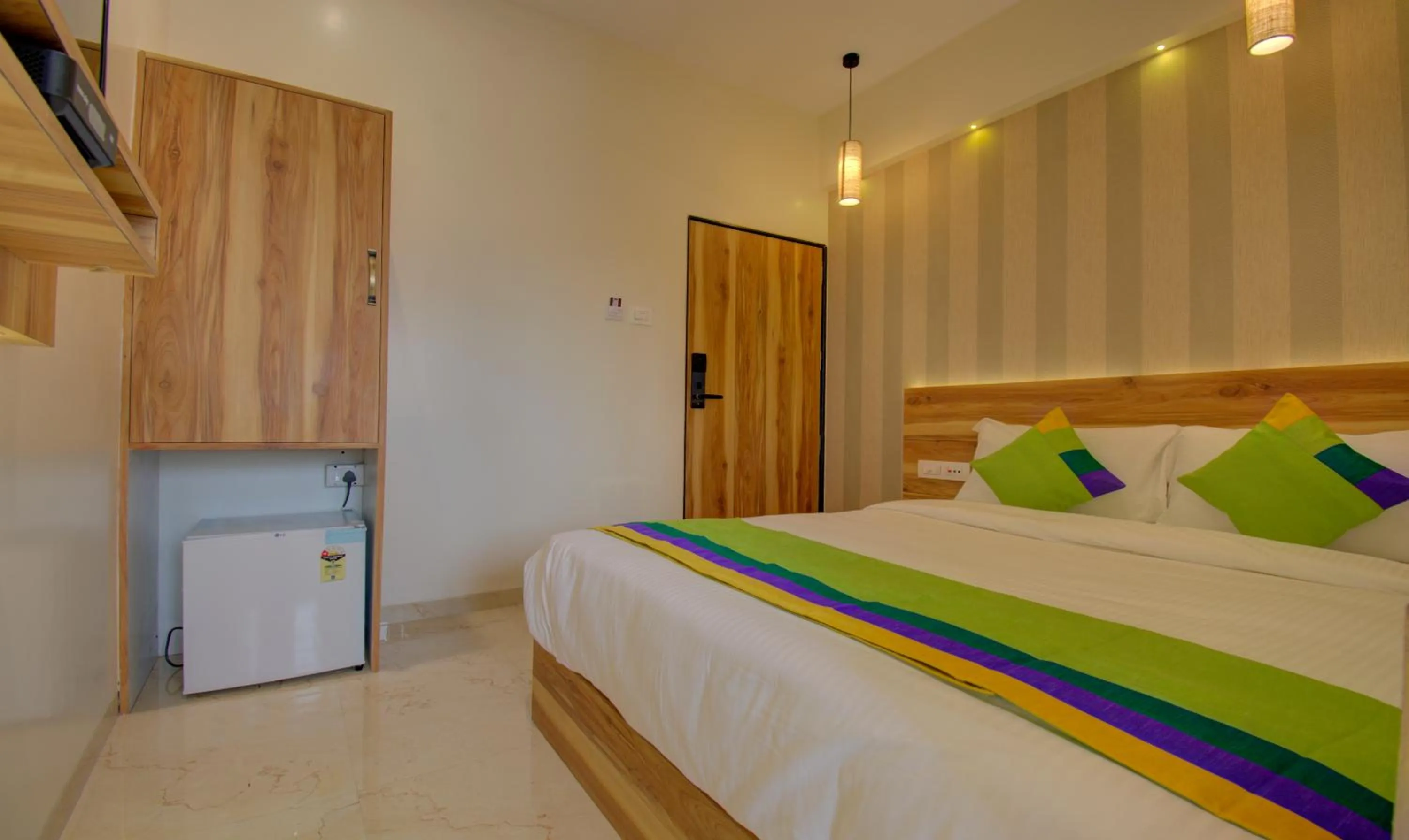 Bed in Hotel Amisha International