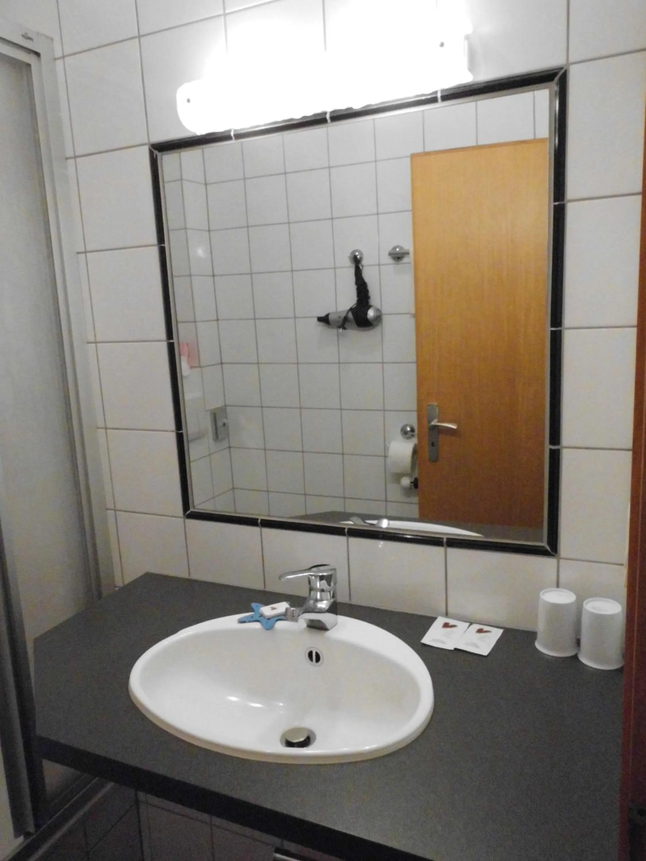 Bathroom in Hotel Haus Hellhohl Garni