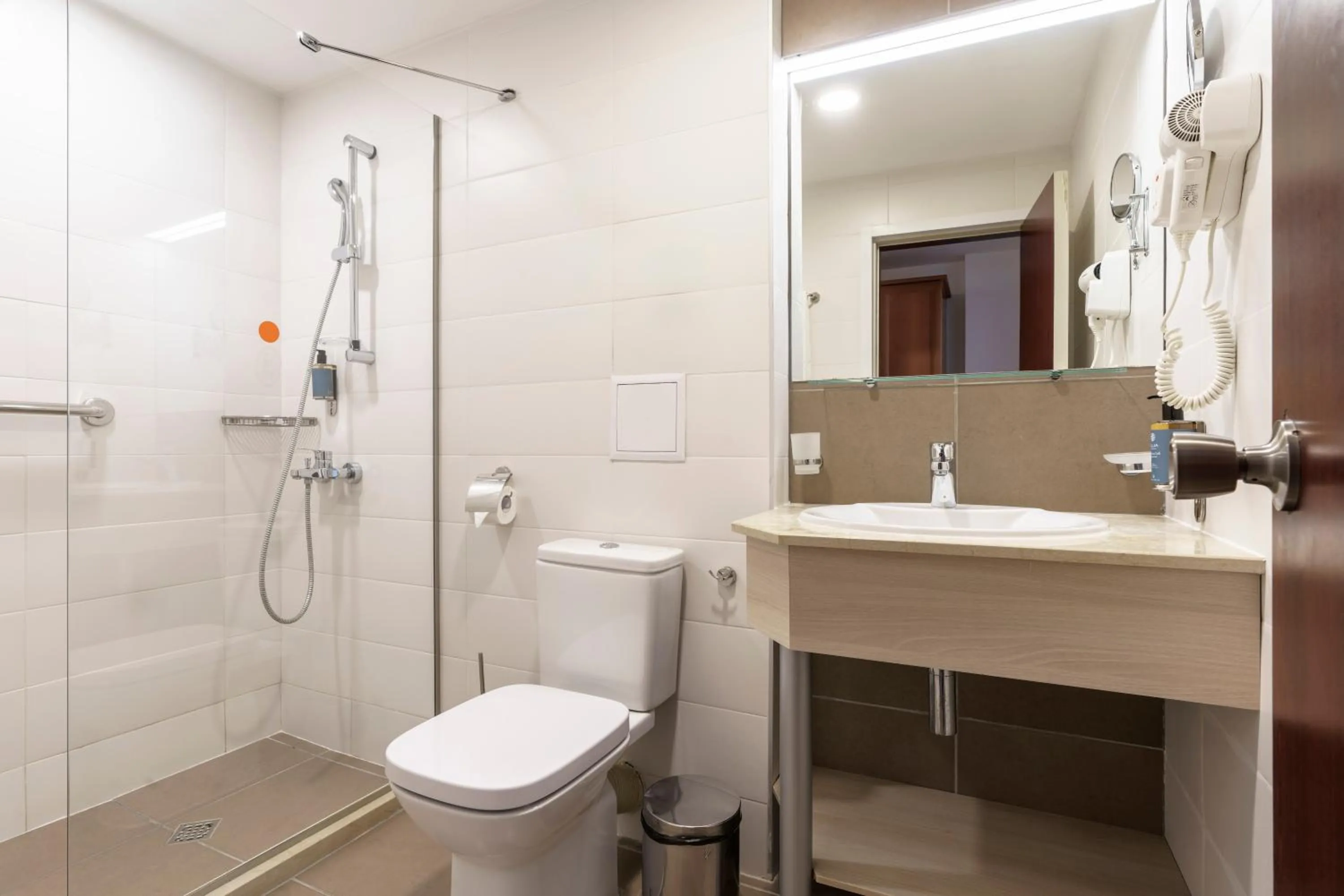 Bathroom in AluaSun Helios Beach - All Inclusive