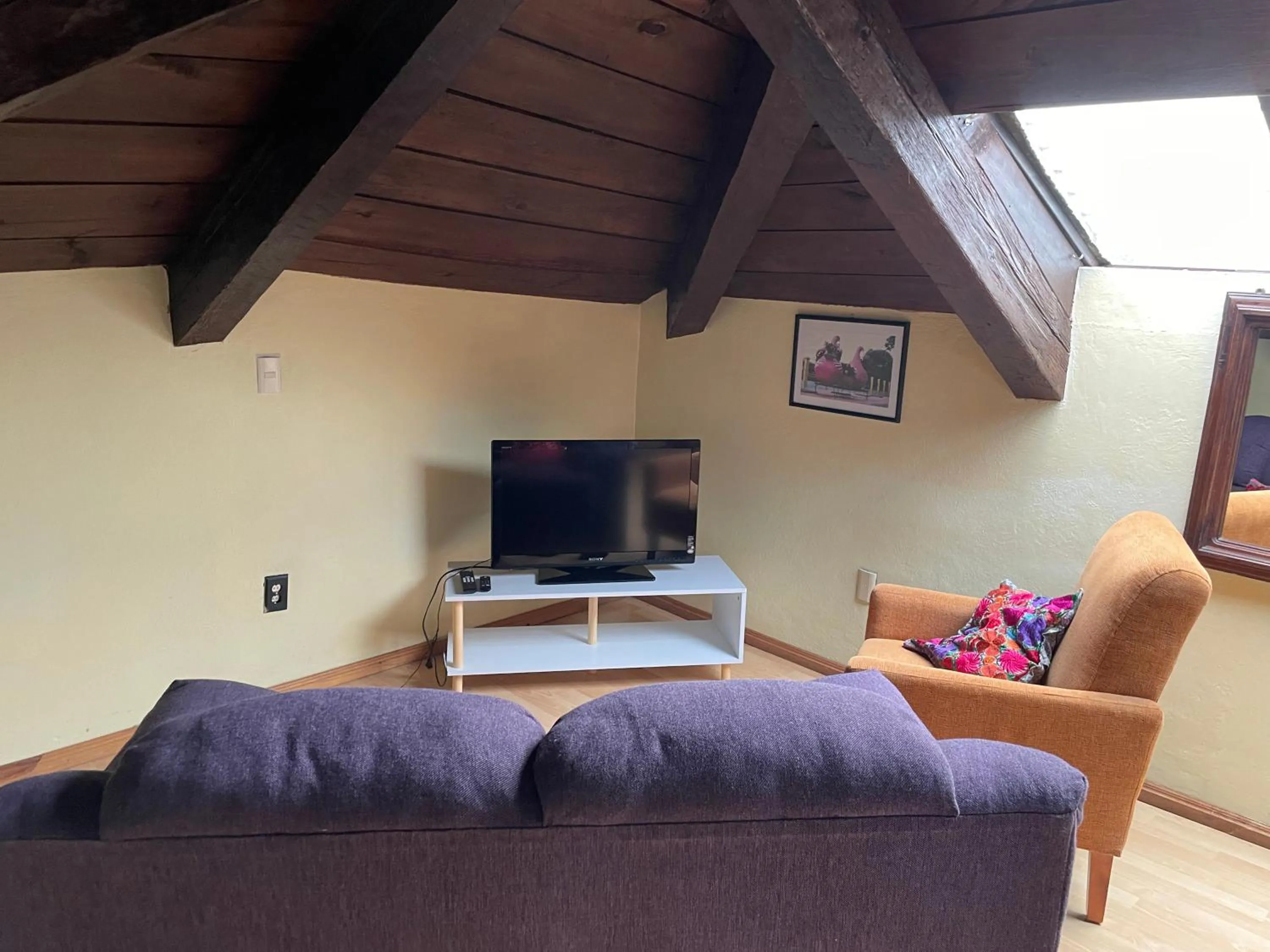 Communal lounge/ TV room in Kukurutz Residencia