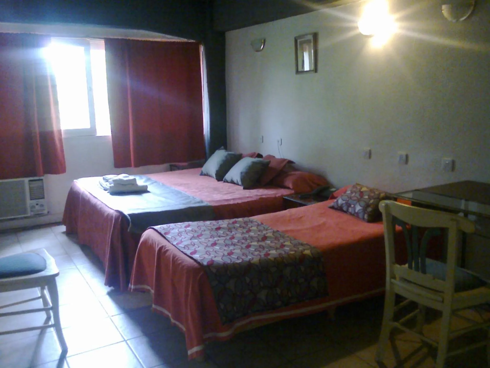 Photo of the whole room, Bed in Plaza Milenium