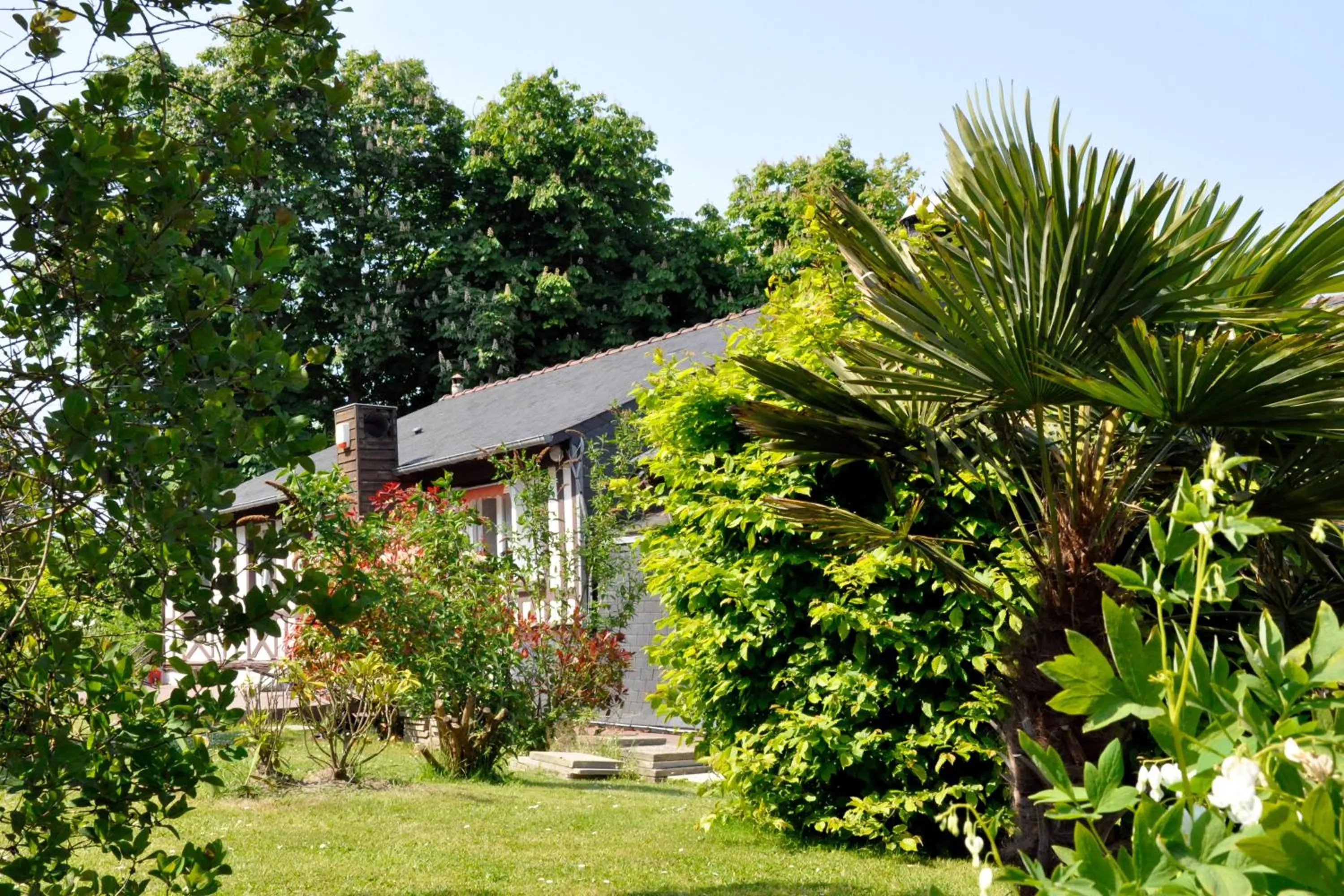 Garden view in Hostellerie et SPA de la Vieille Ferme