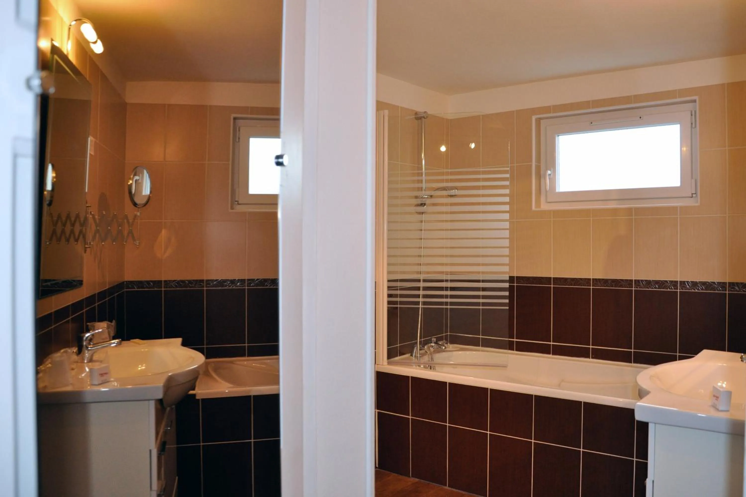 Bathroom in Hostellerie et SPA de la Vieille Ferme