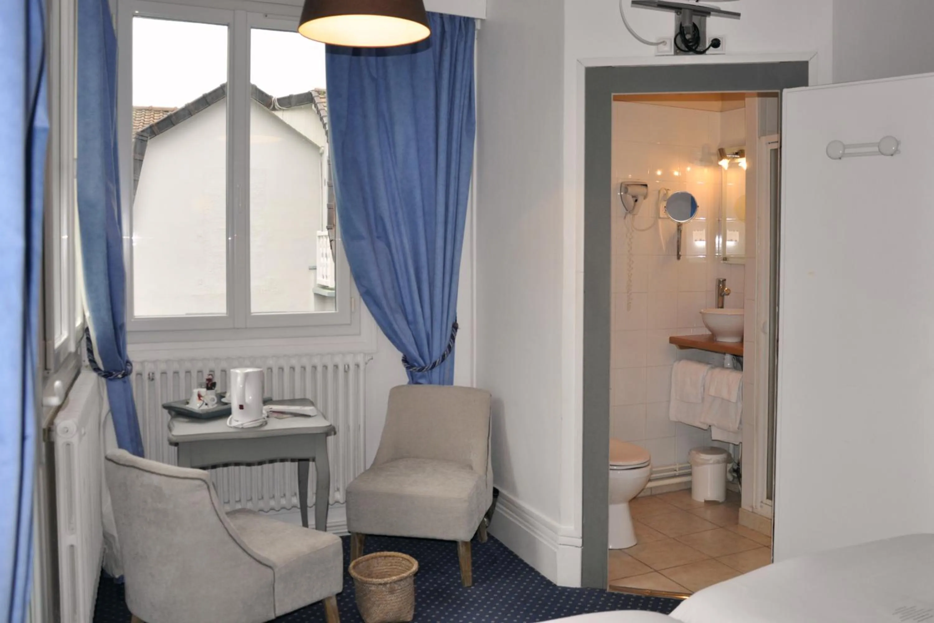 Bedroom in Hostellerie et SPA de la Vieille Ferme