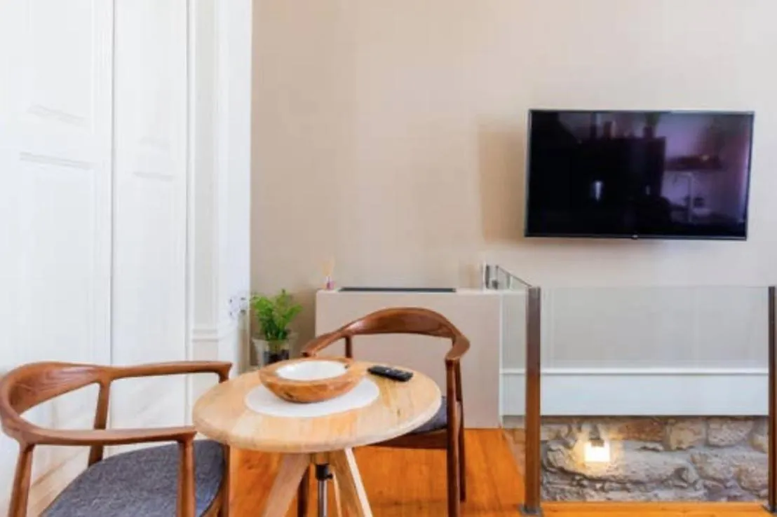 Communal lounge/ TV room in Maison Cabral