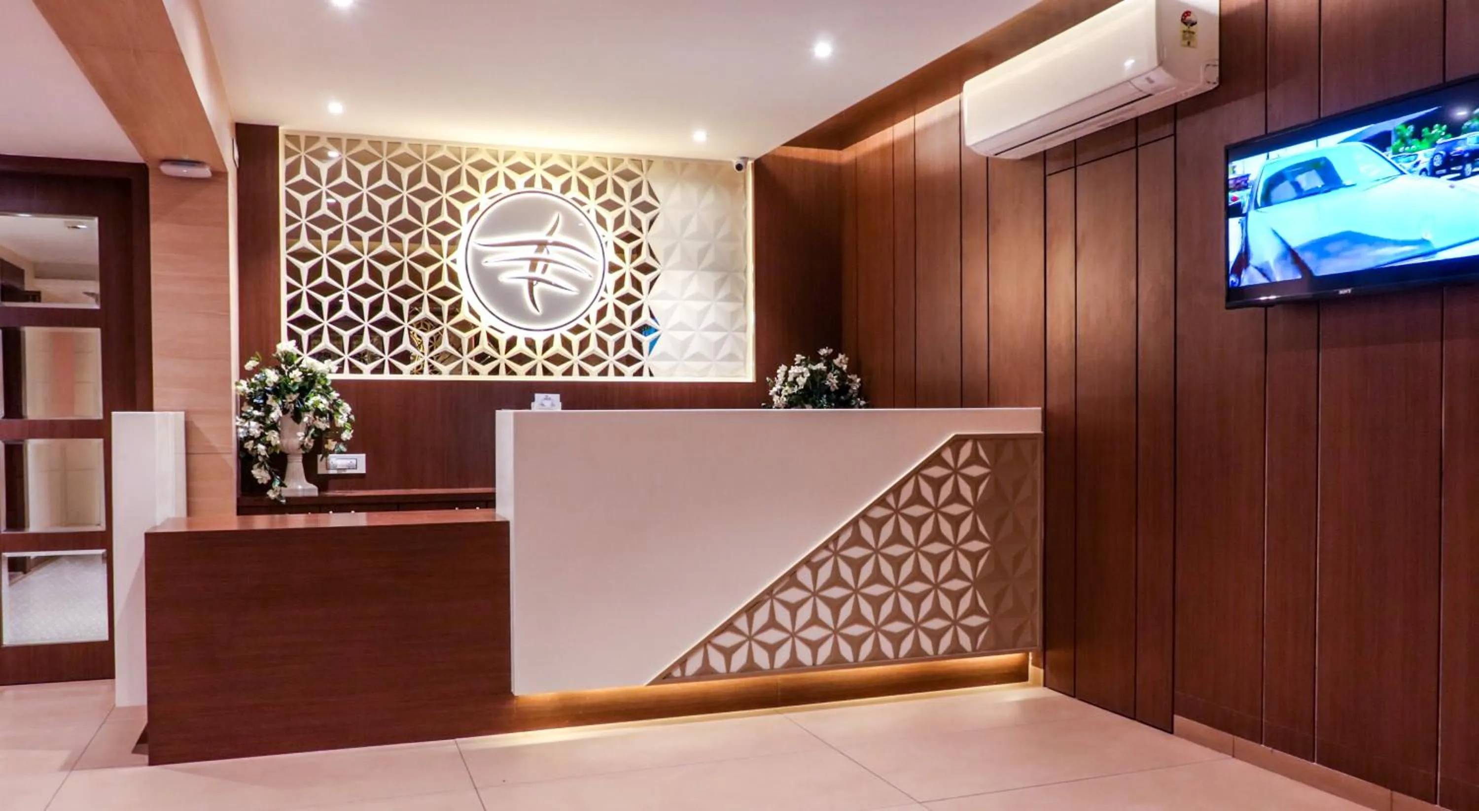 Property logo or sign in Rudra Shelter Business Hotel