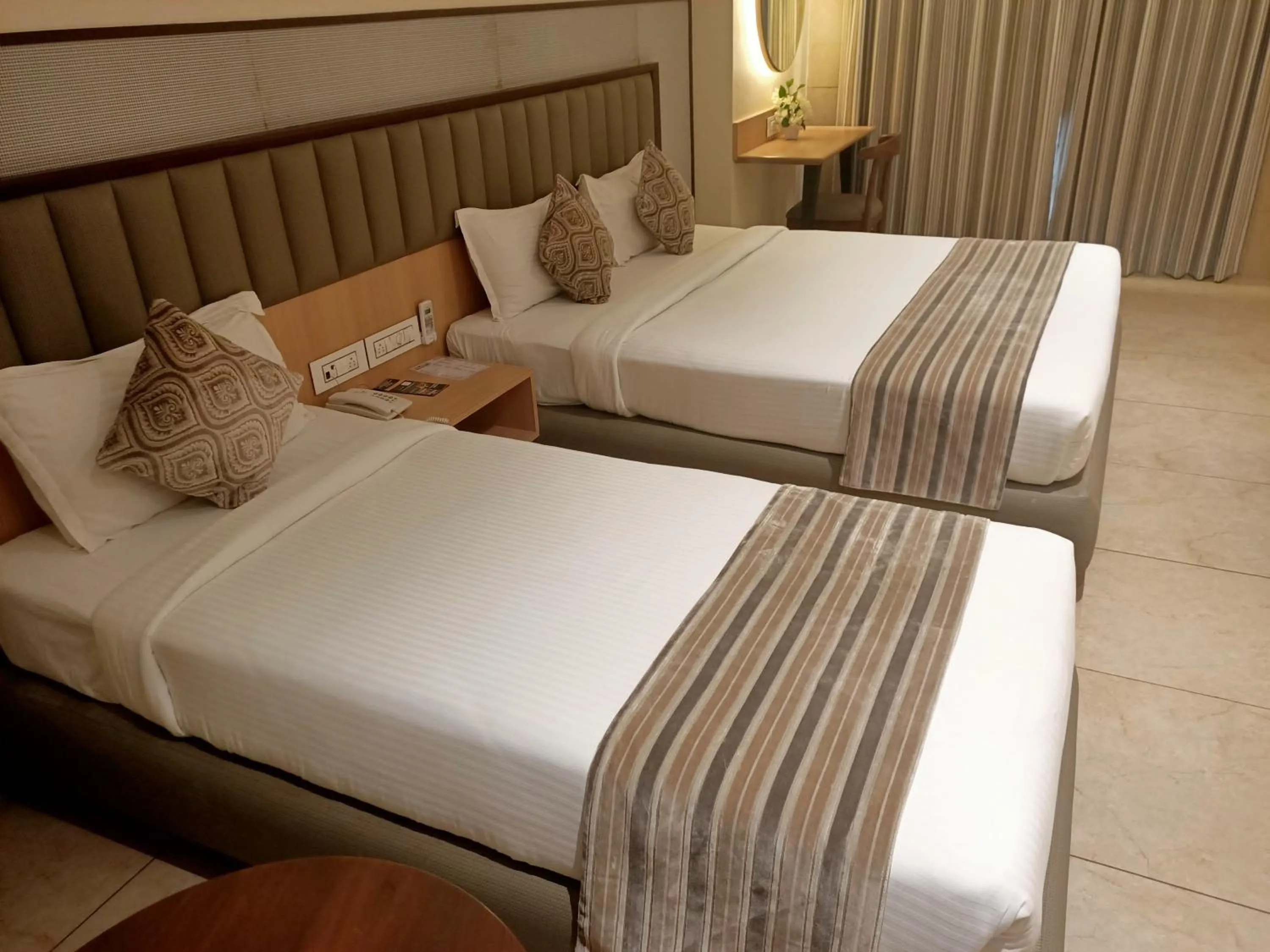 Bed in Rudra Shelter Business Hotel