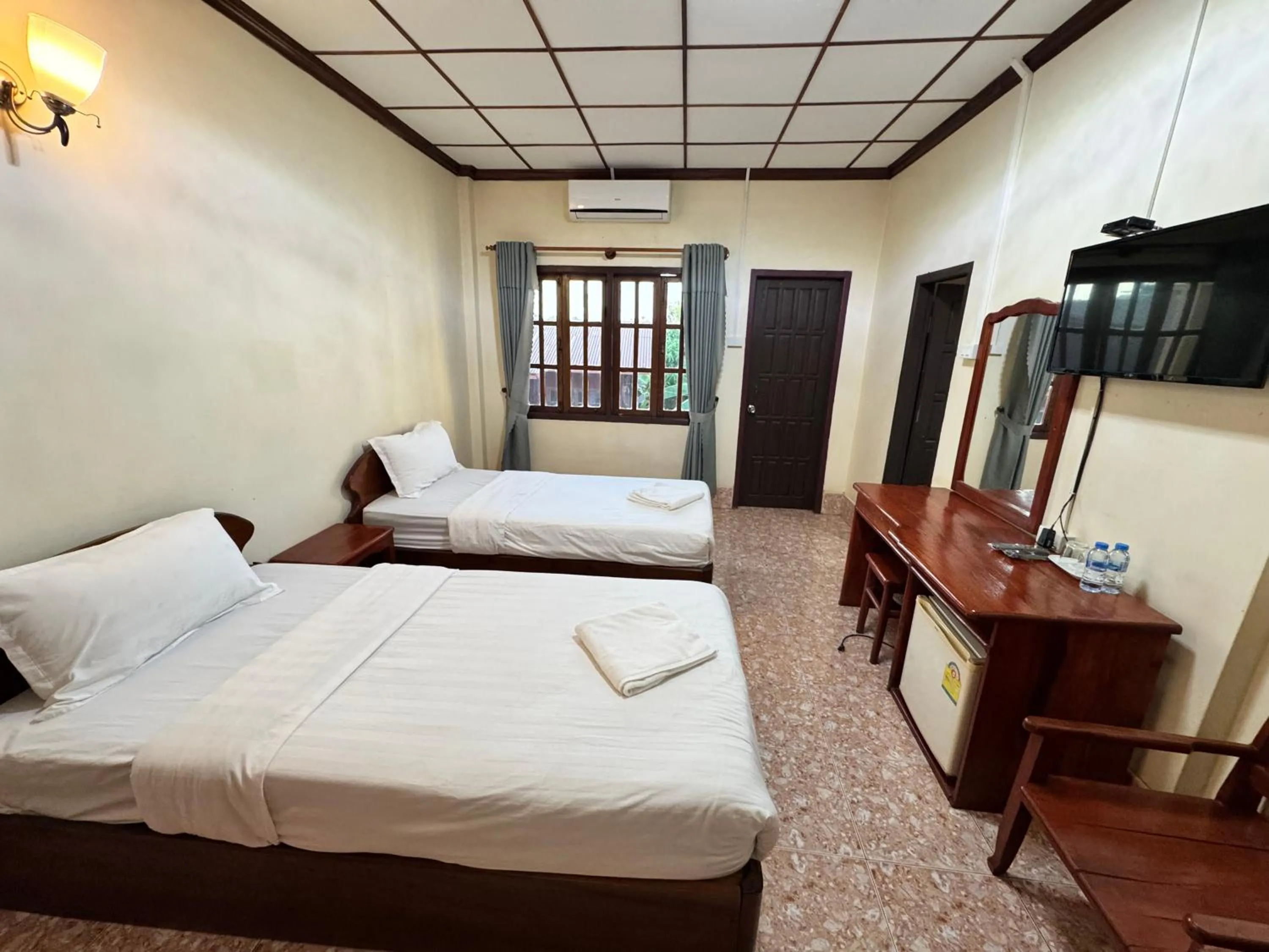 Bed in Phaythavone Hotel