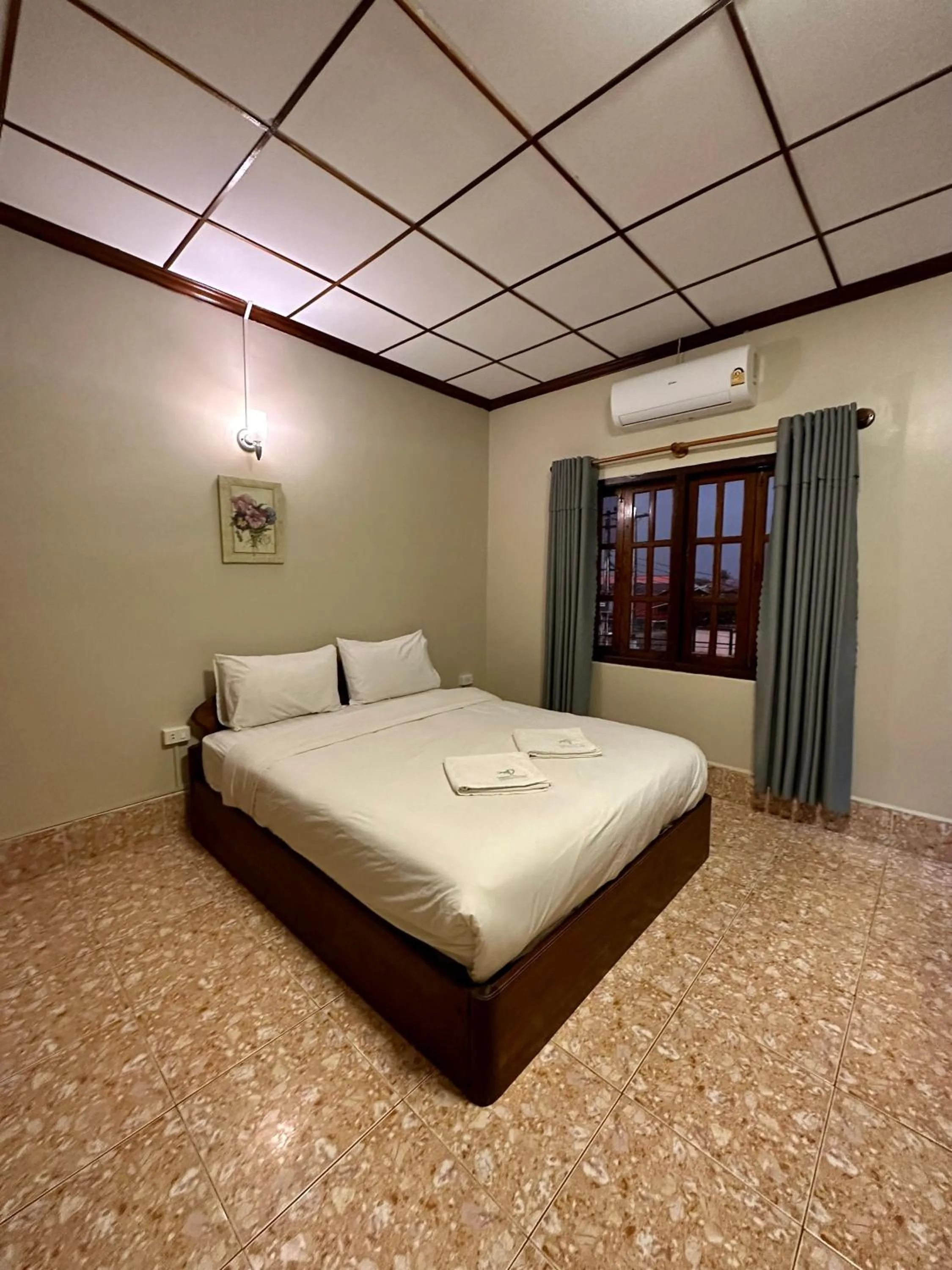 Bed in Phaythavone Hotel