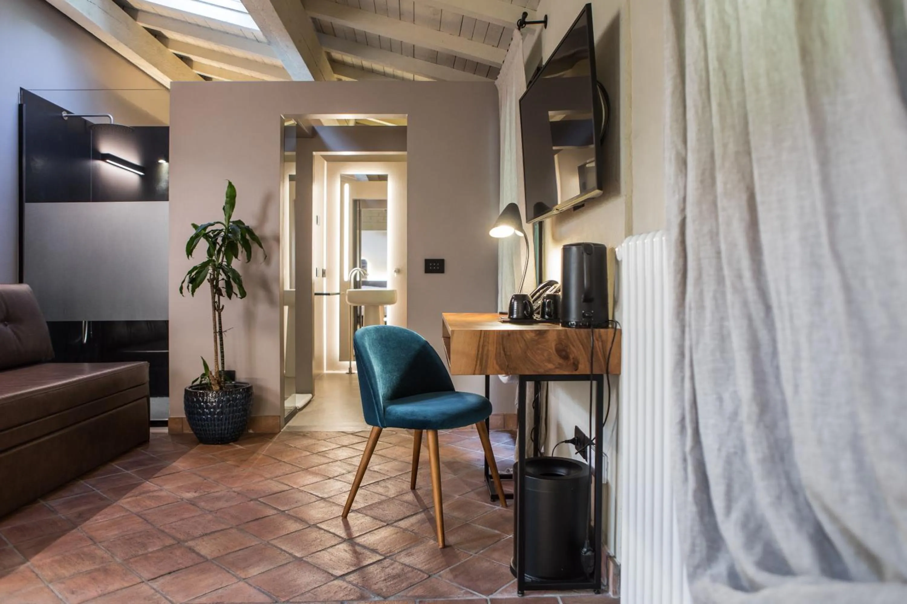 Seating area in Cà Toresele Relais Osteria Garden