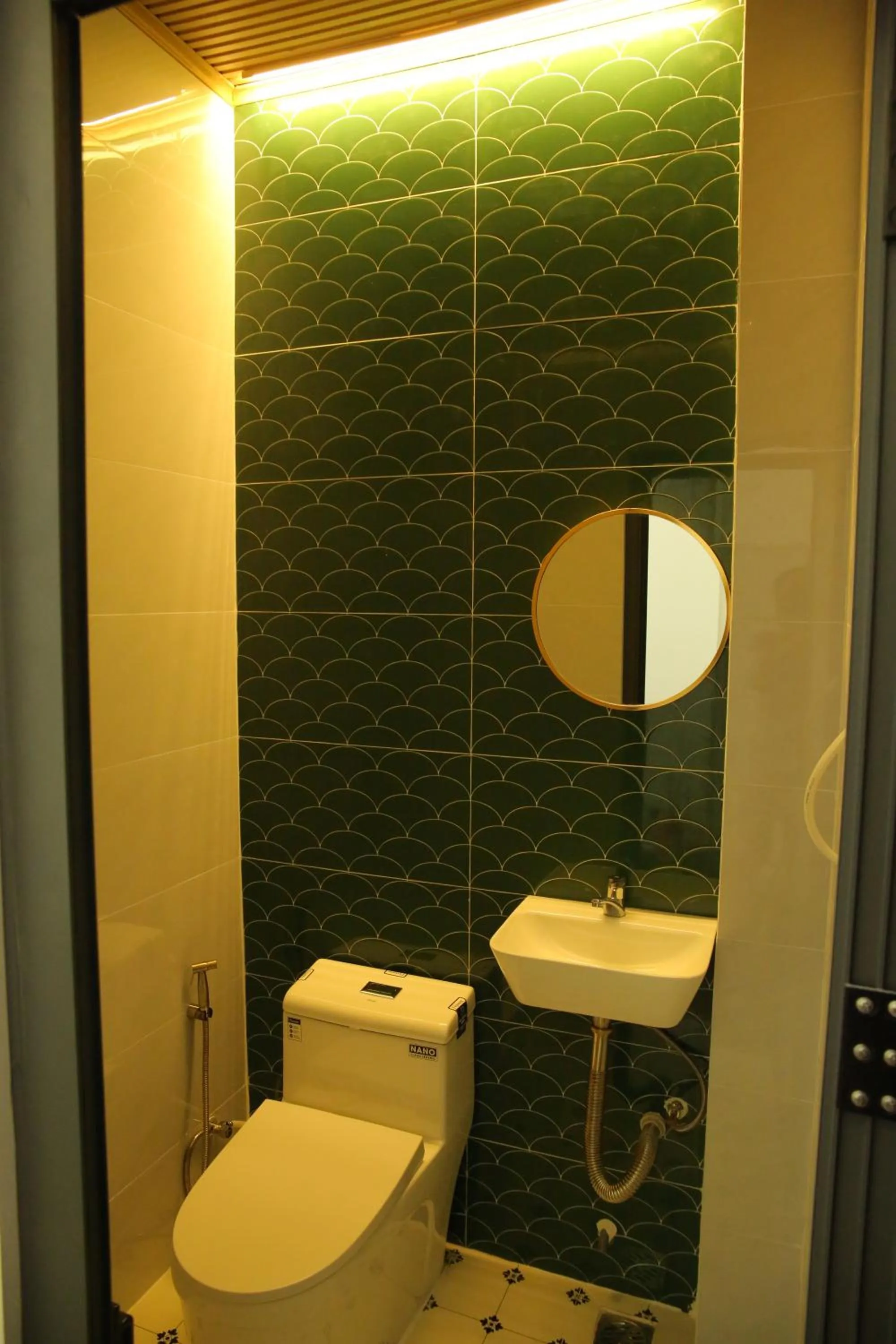 Toilet in Violet Star Hotel and Spa