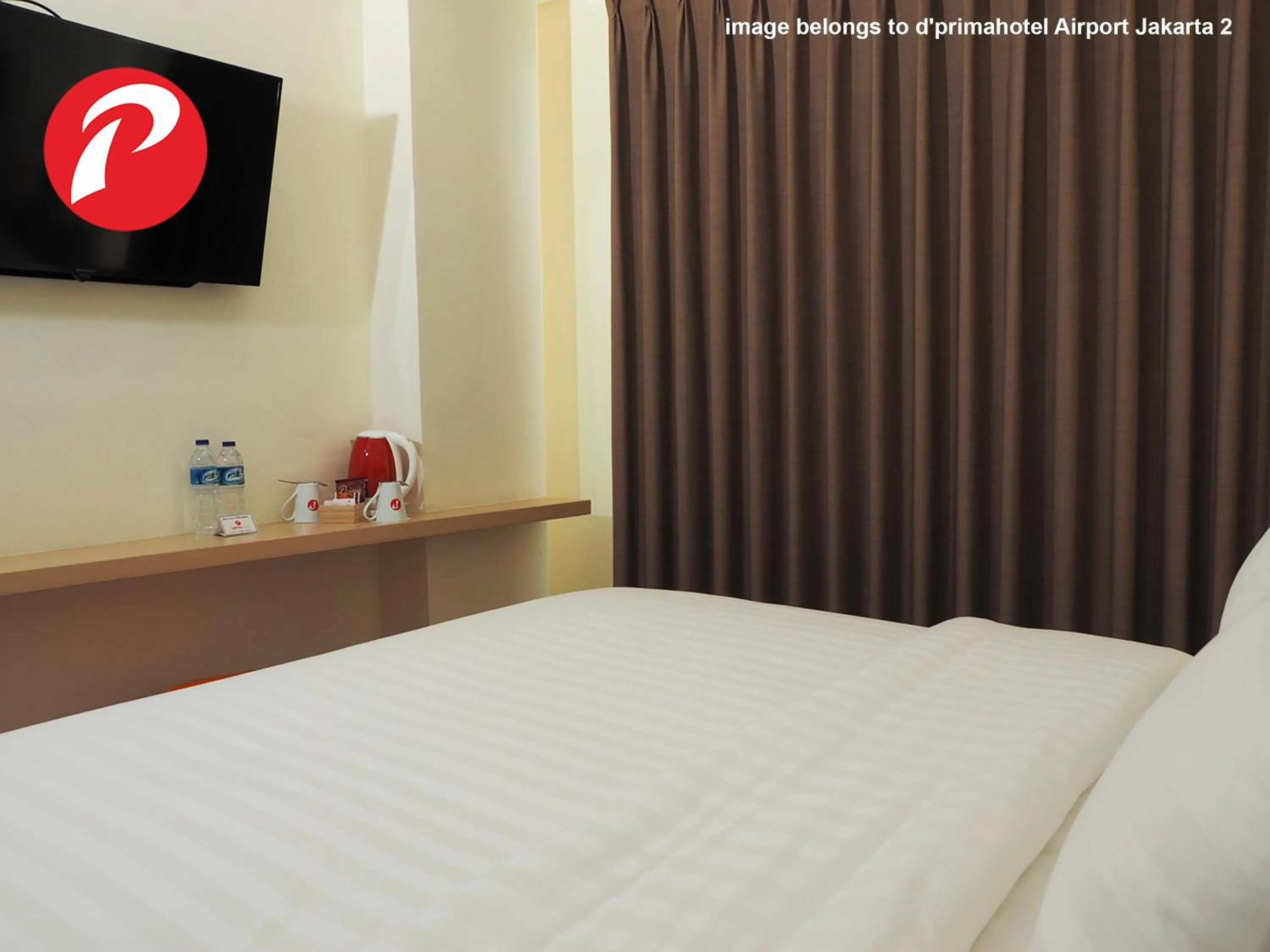 Coffee/tea facilities, Bed in d'primahotel Panakkukang Makassar (Formerly Fave Panakkukang)