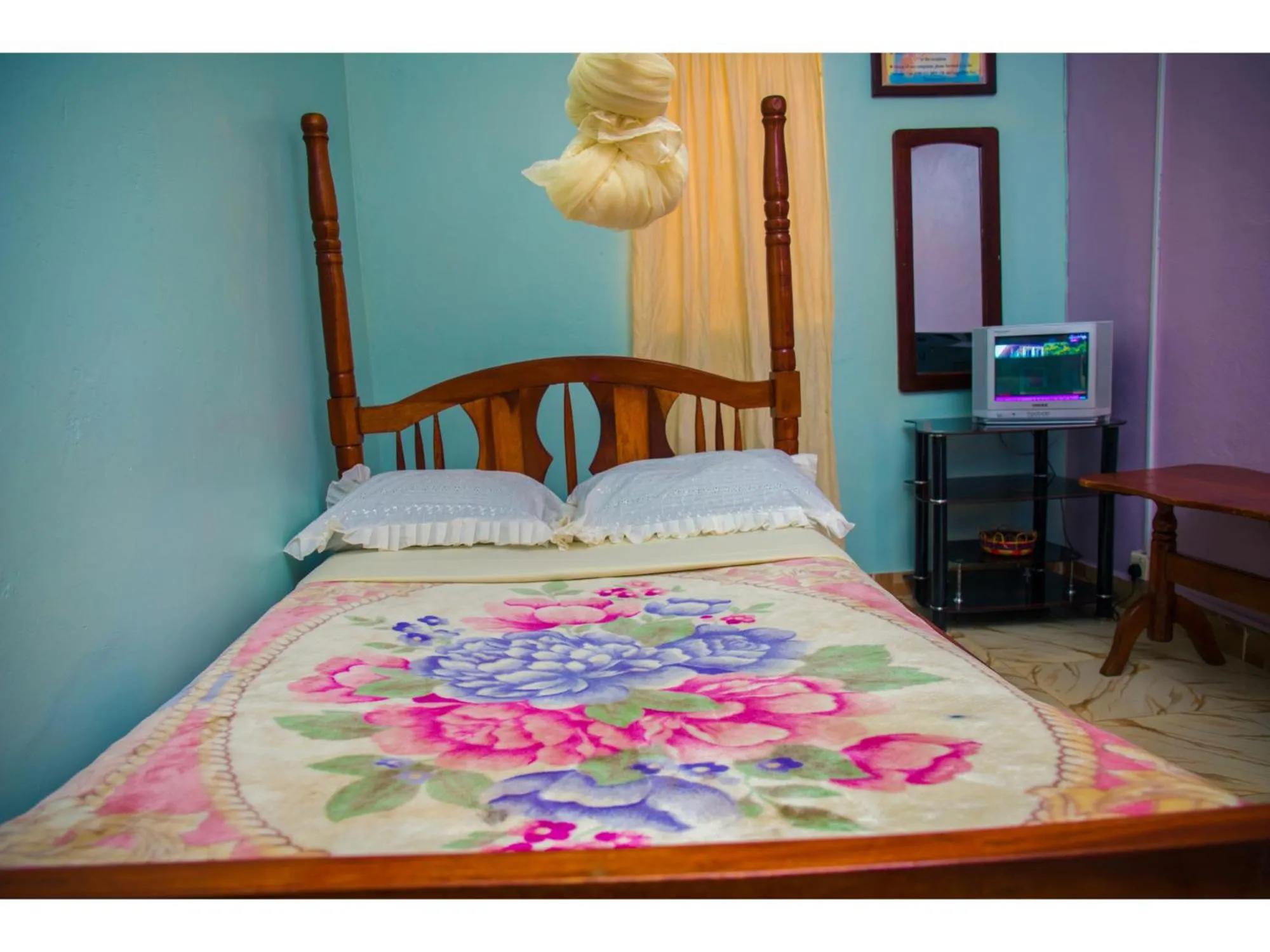 Bedroom in Merona Hotel