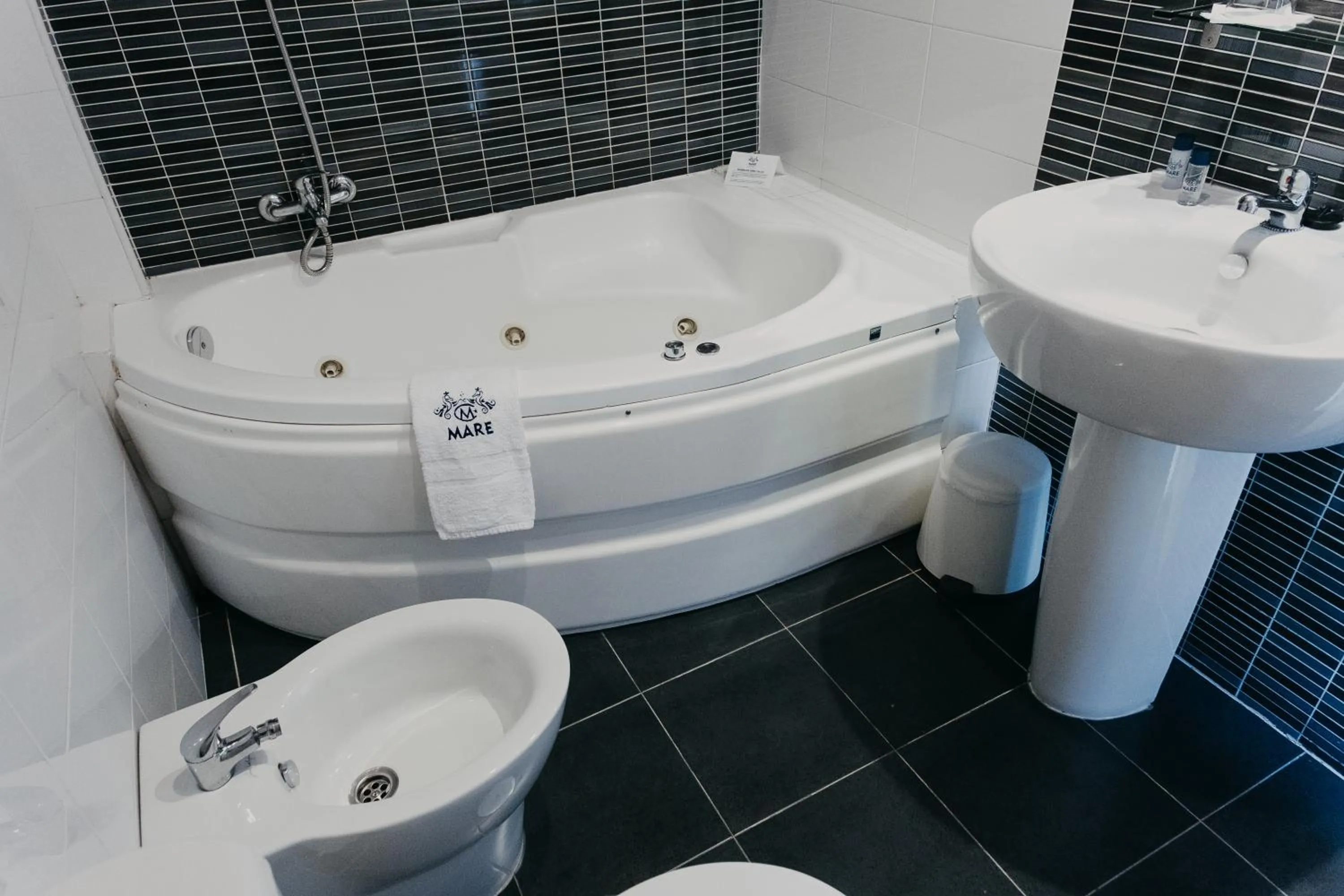 Toilet in Mare Hotel