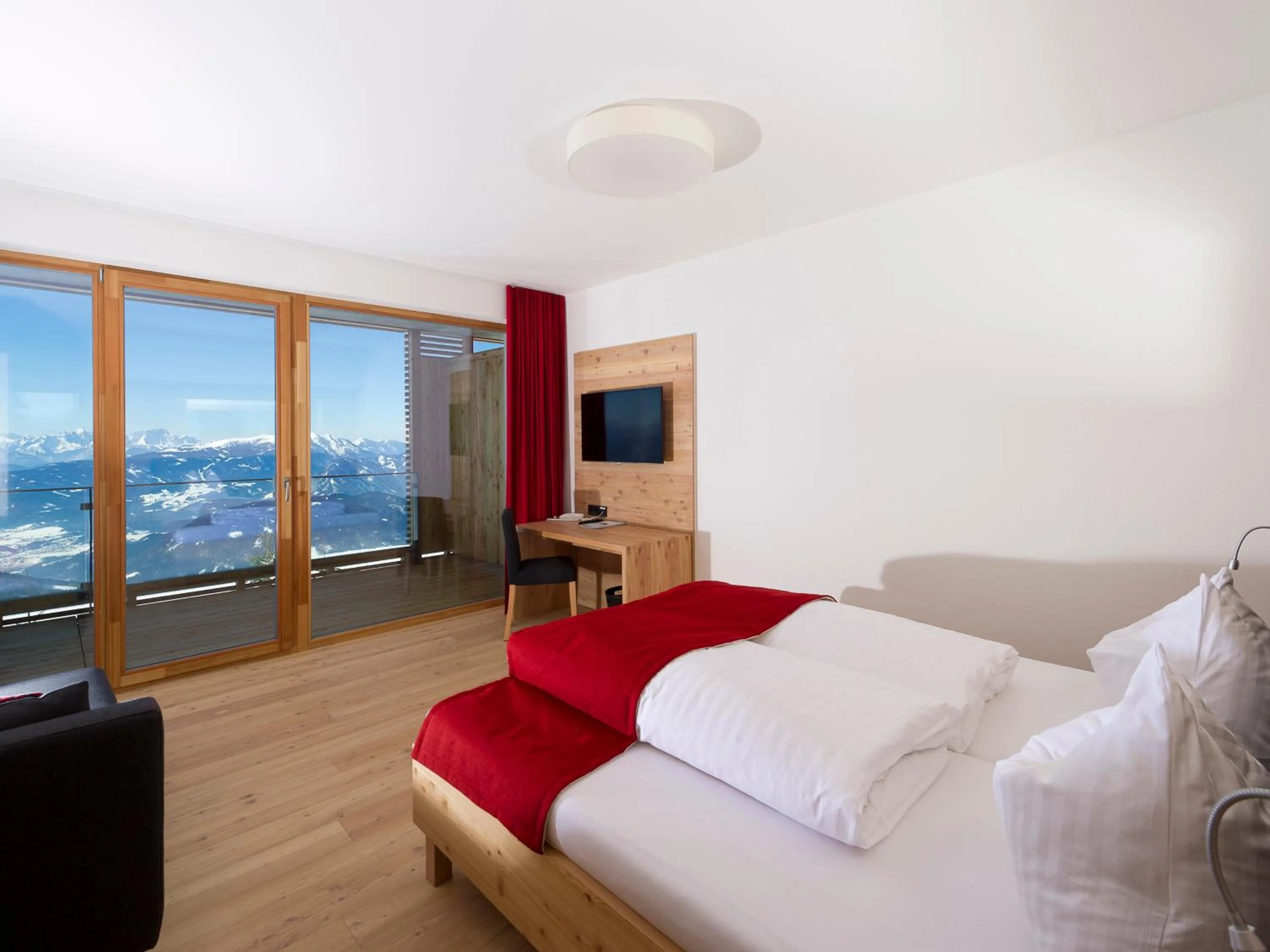 Photo of the whole room, Bed in Alpinhotel Pacheiner