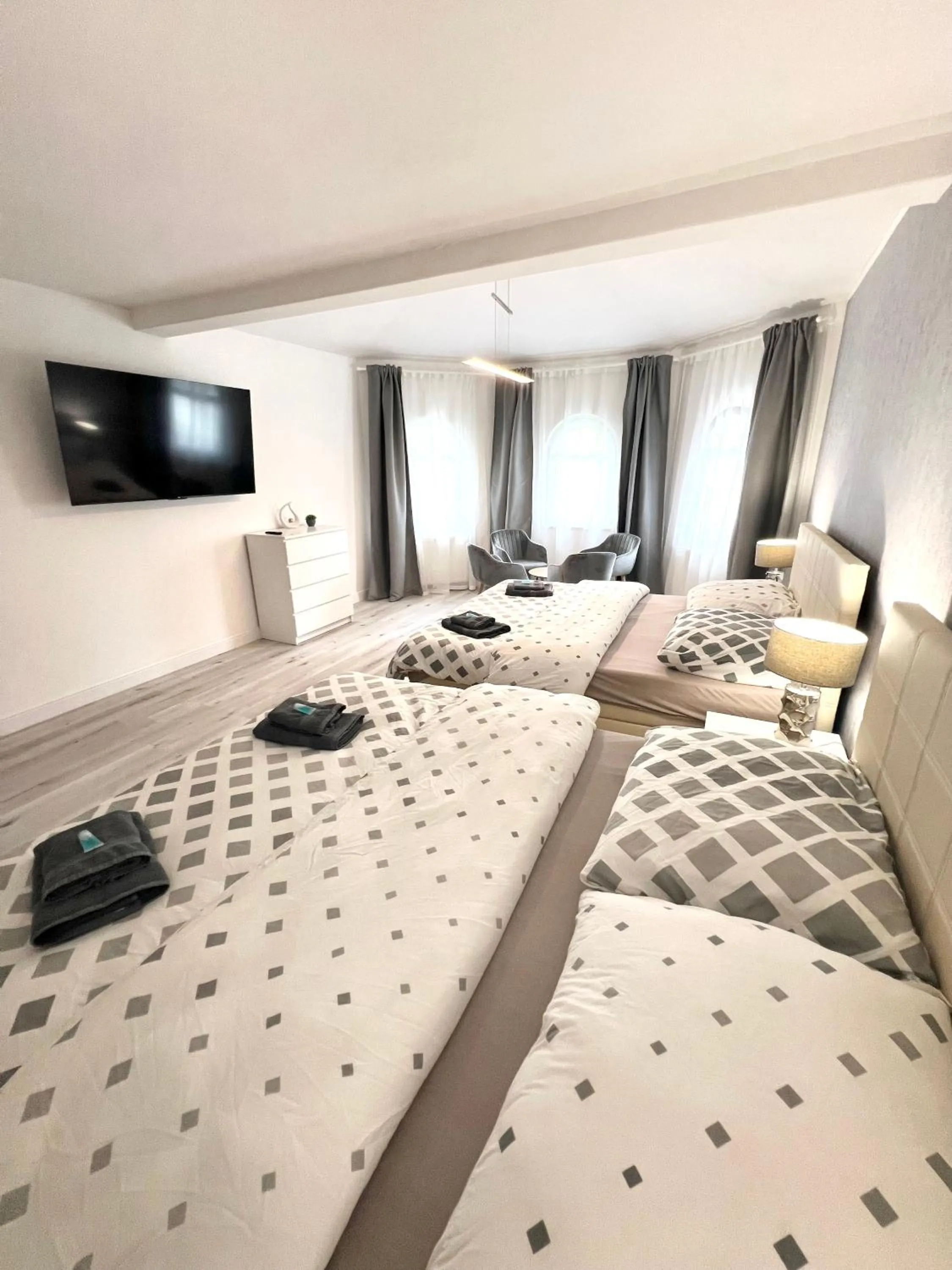 Bed in GrandLux Villa & Spa