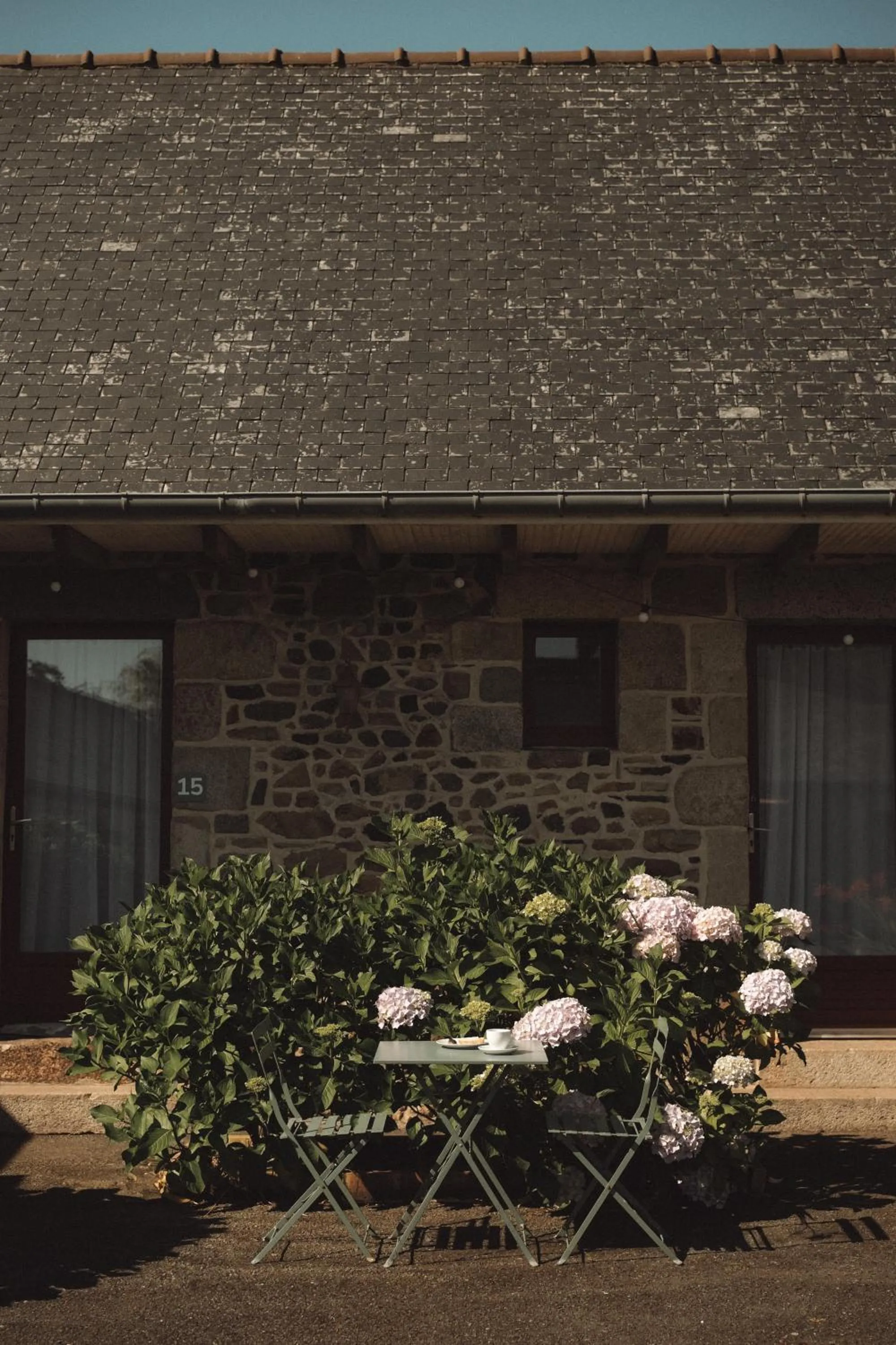 Property building in Hôtel Les Voisins Beaucemaine