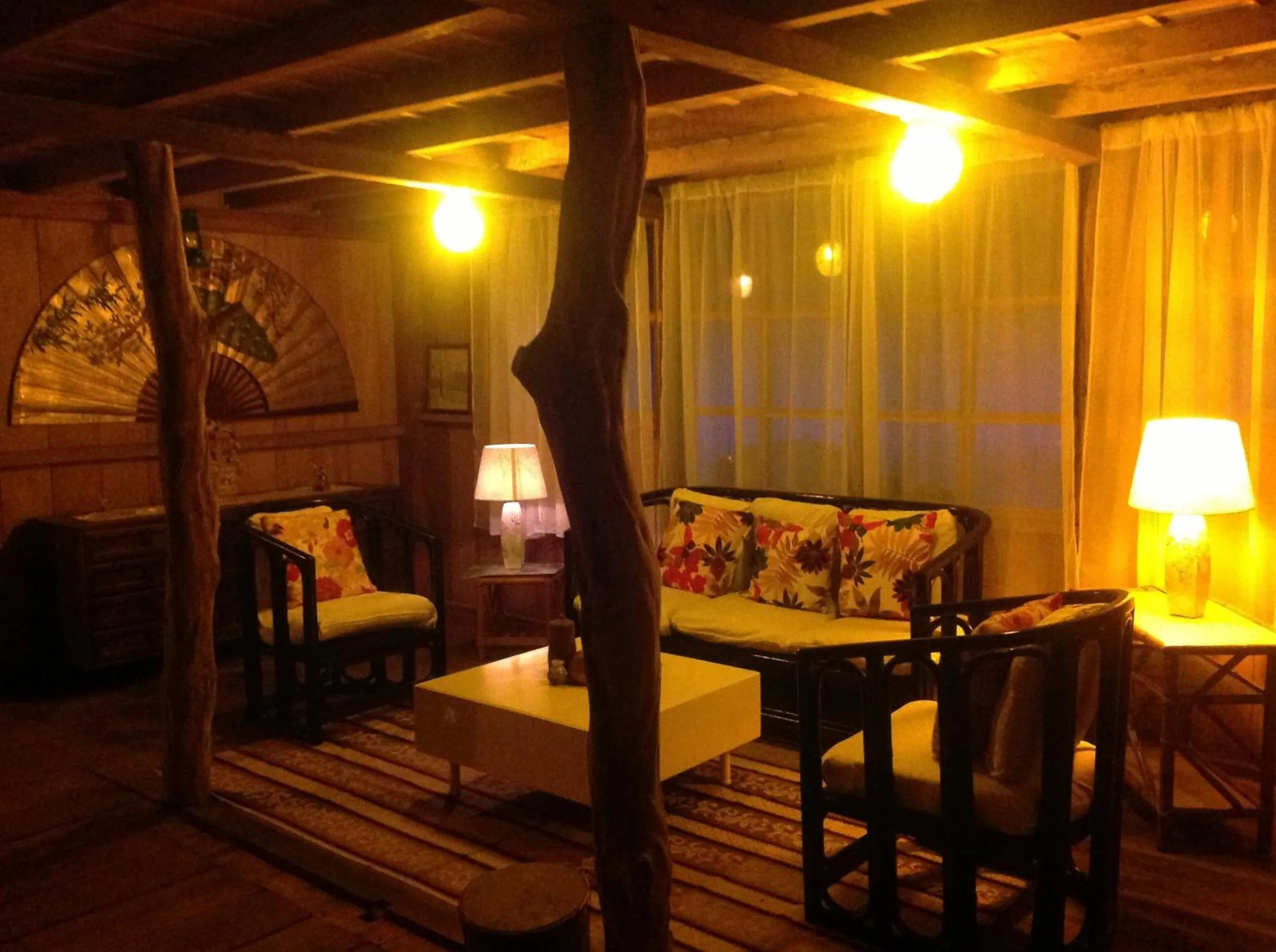 Seating area, Bed in Casa de Piedra