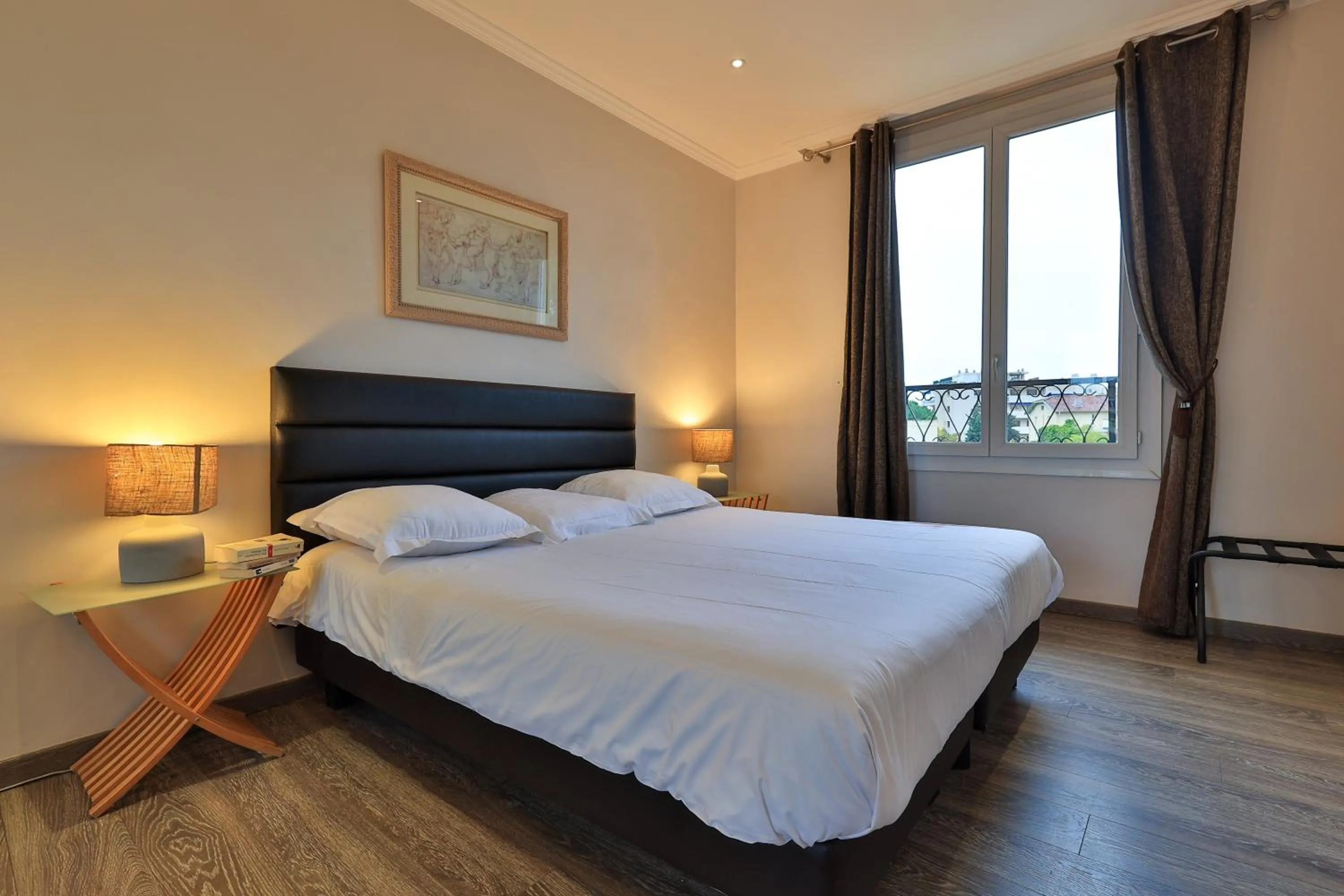 Bed in Emeraude Résidence Hotelière