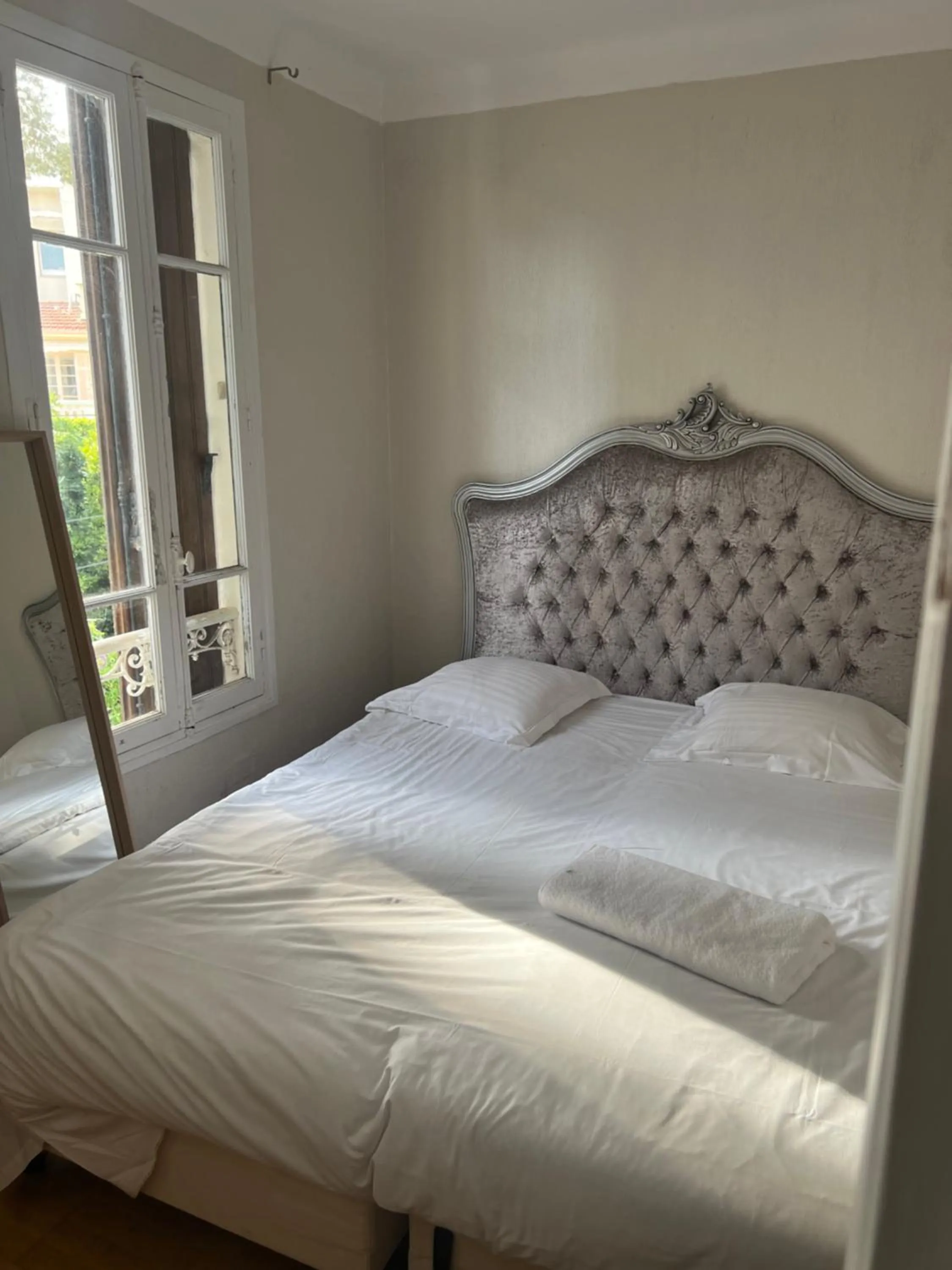 Bed in Emeraude Résidence Hotelière