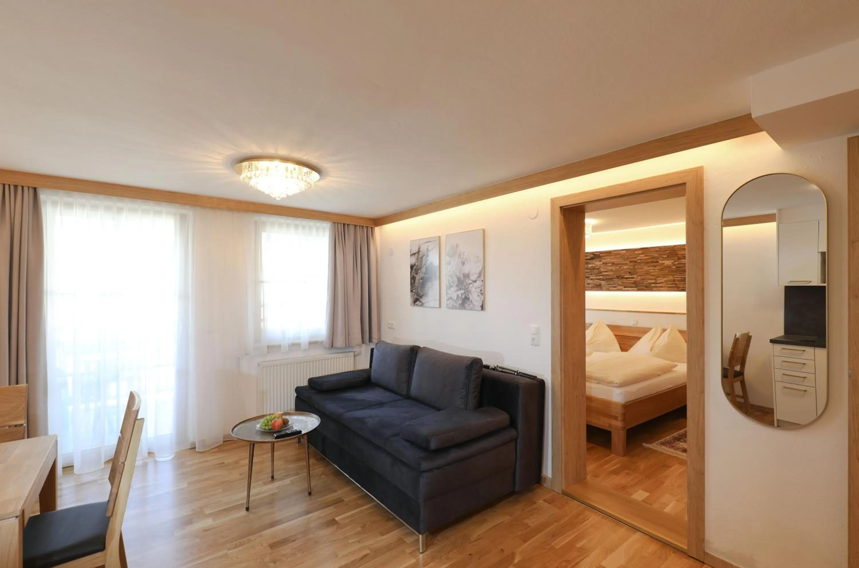 Living room, Bed in Hotel Garni Dorferwirt am Irrsee