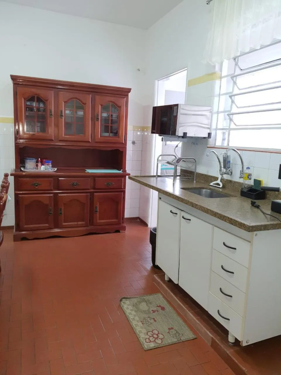 Kitchen or kitchenette in Pousada Monte Alegre