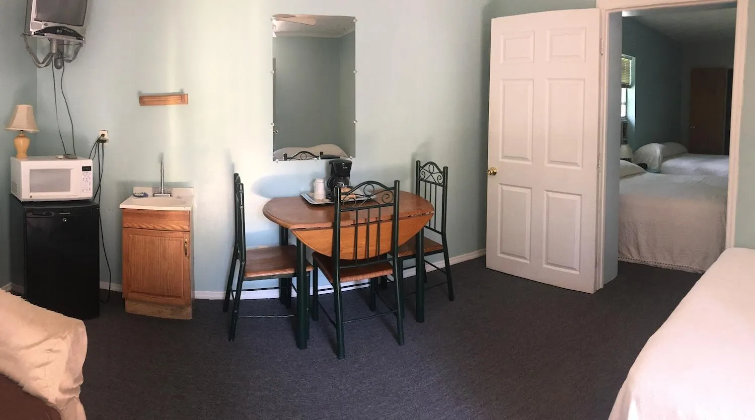 Bed in Cindy’s Motel & RV Park