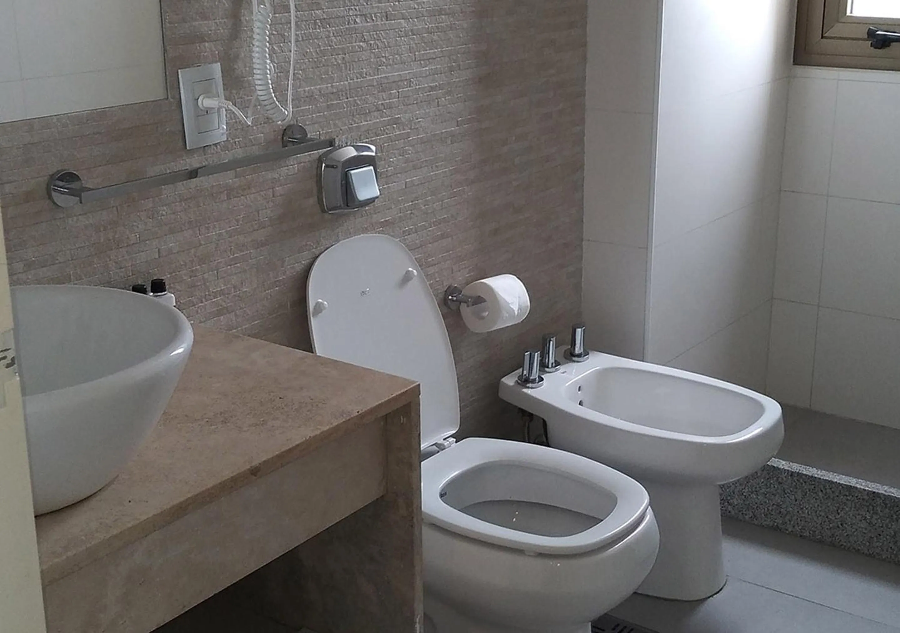 Bathroom in Apart Hotel Quijote by DOT Suites