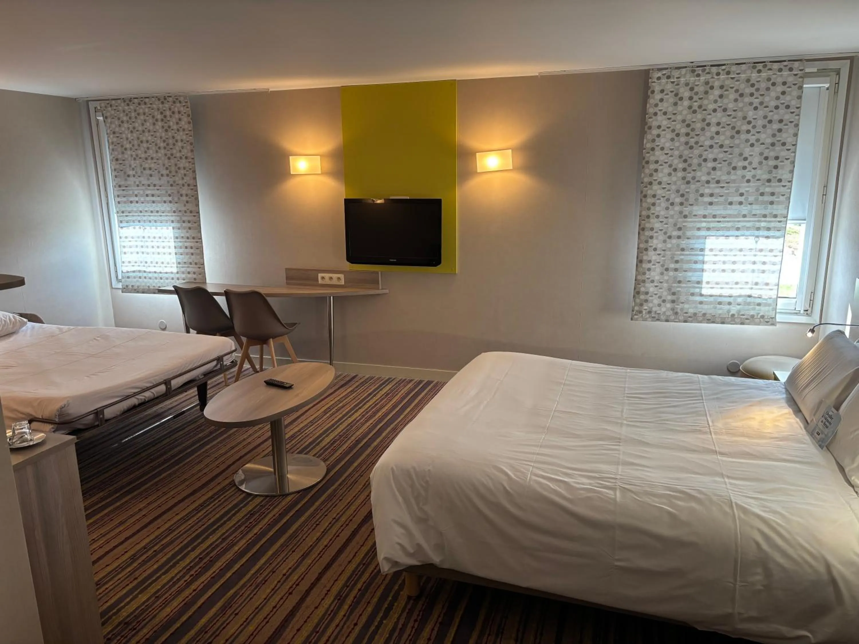 Photo of the whole room, Bed in Kyriad Lyon Est - Saint Bonnet De Mure