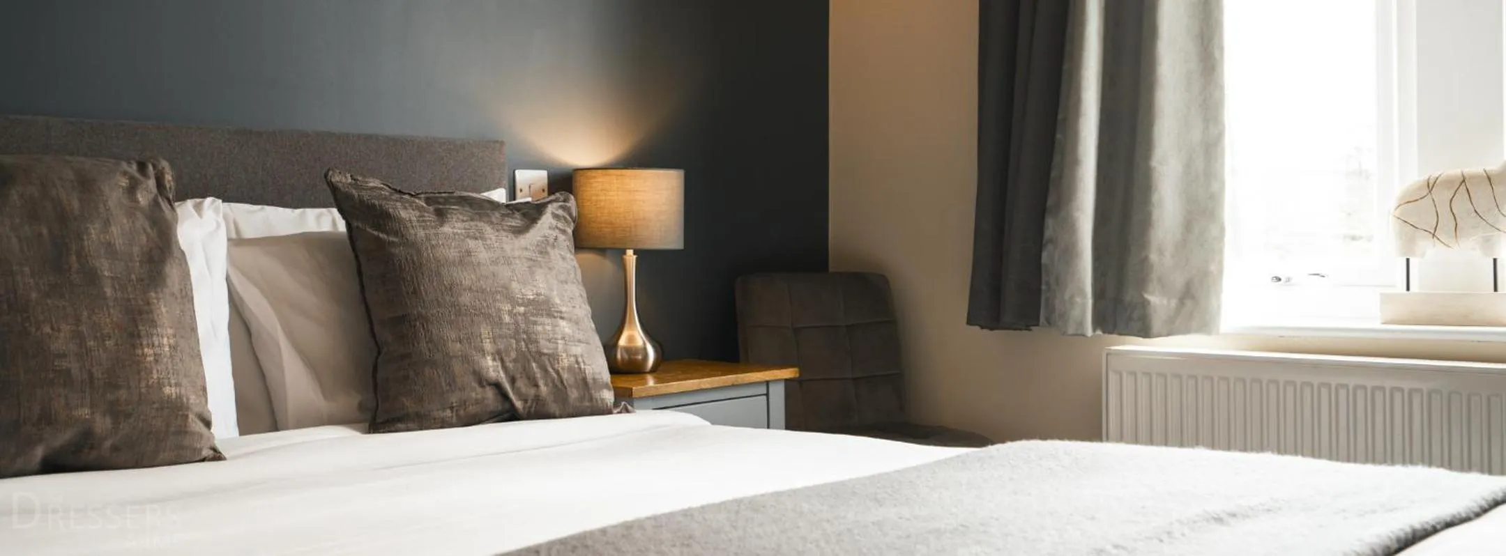 Bed in Rooms at The Dressers Arms