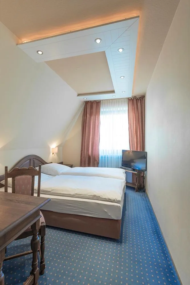 Photo of the whole room, Bed in Hotel Domschenke