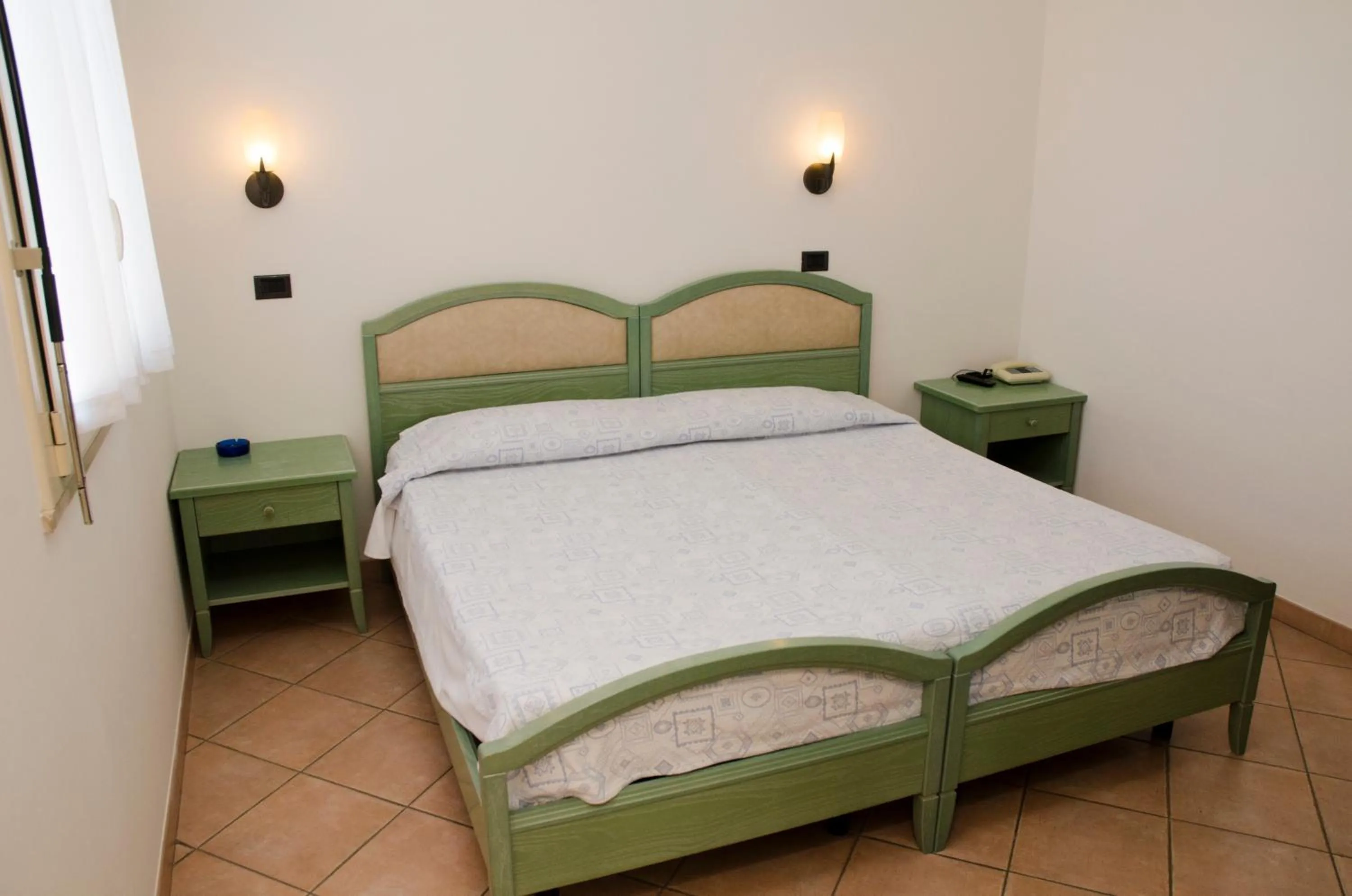 Bed in Albergo Cenni