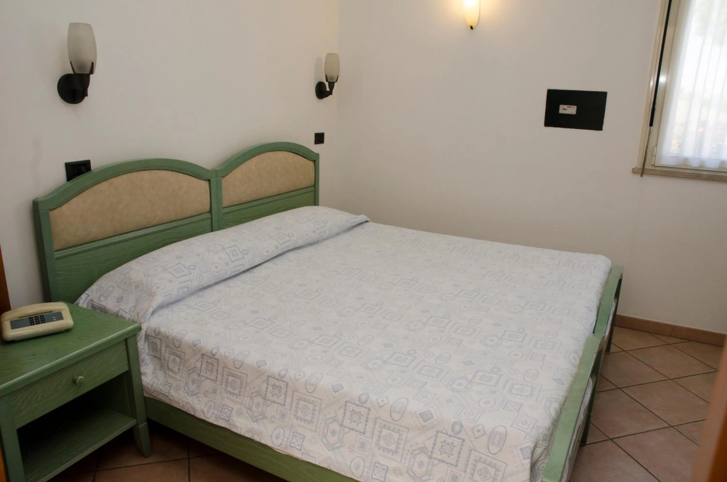Bed in Albergo Cenni