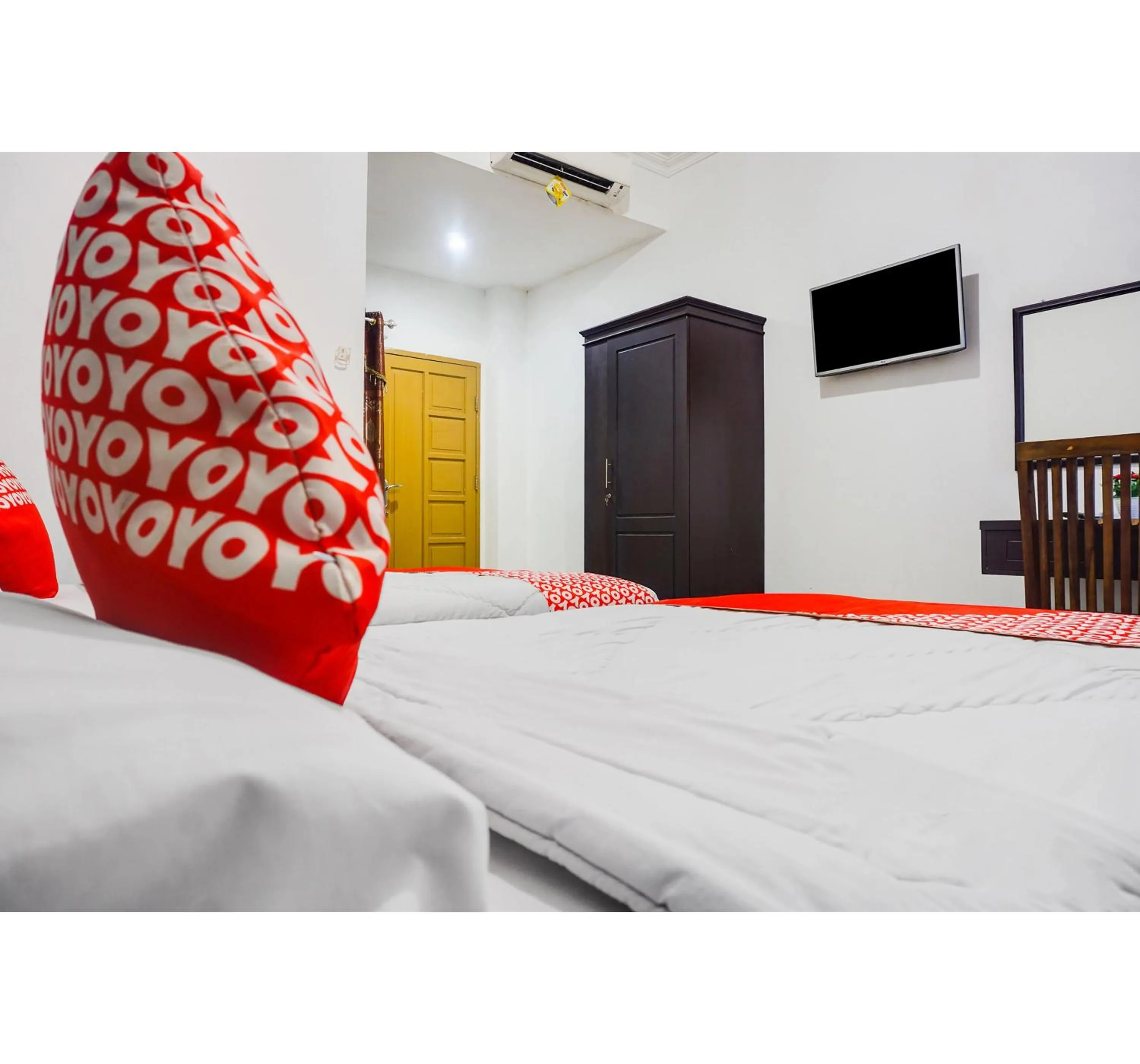 Bed in OYO Flagship 91534 Wisma Metro Permai
