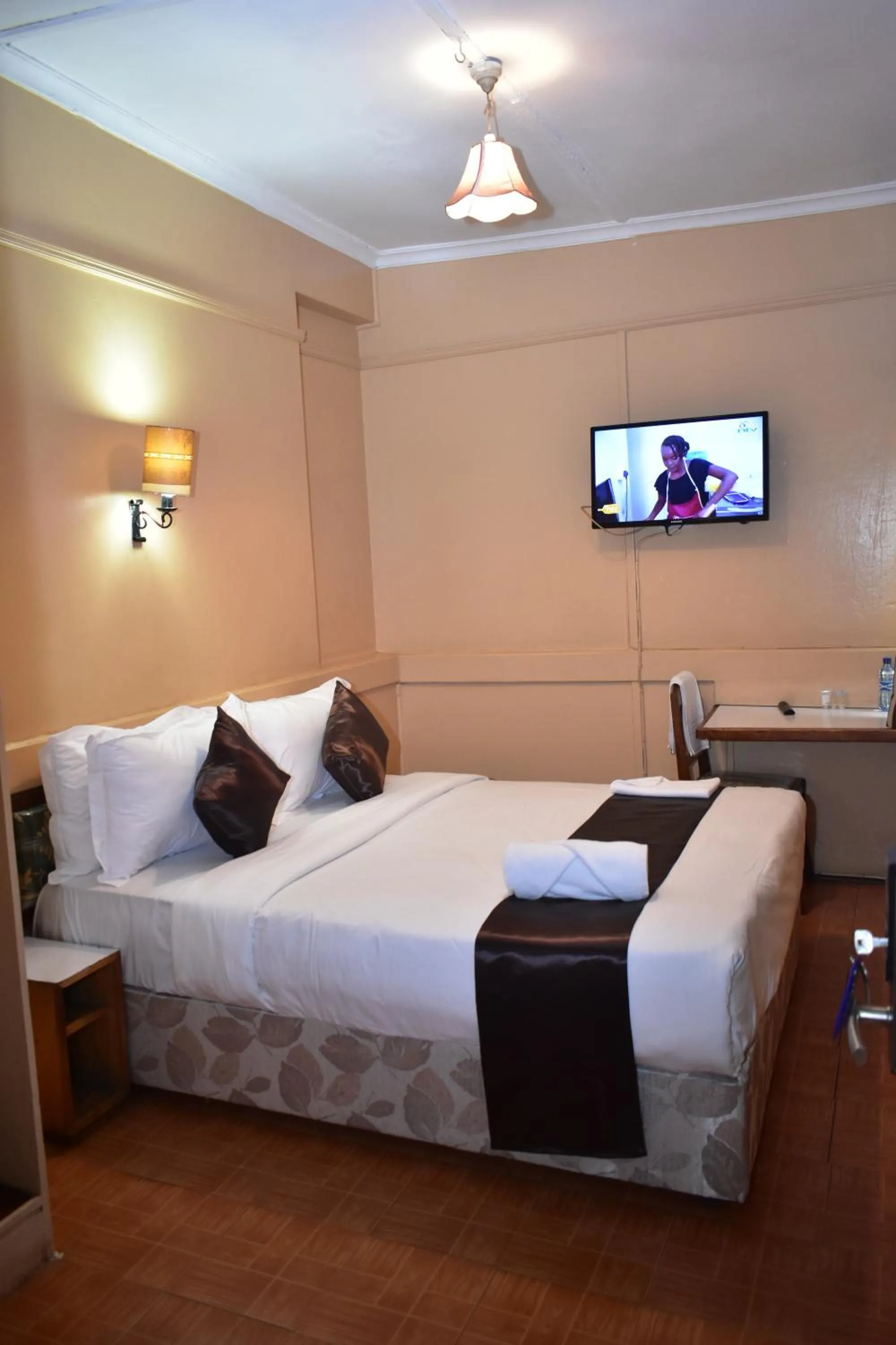 Bed in Impala Hotel Parklands