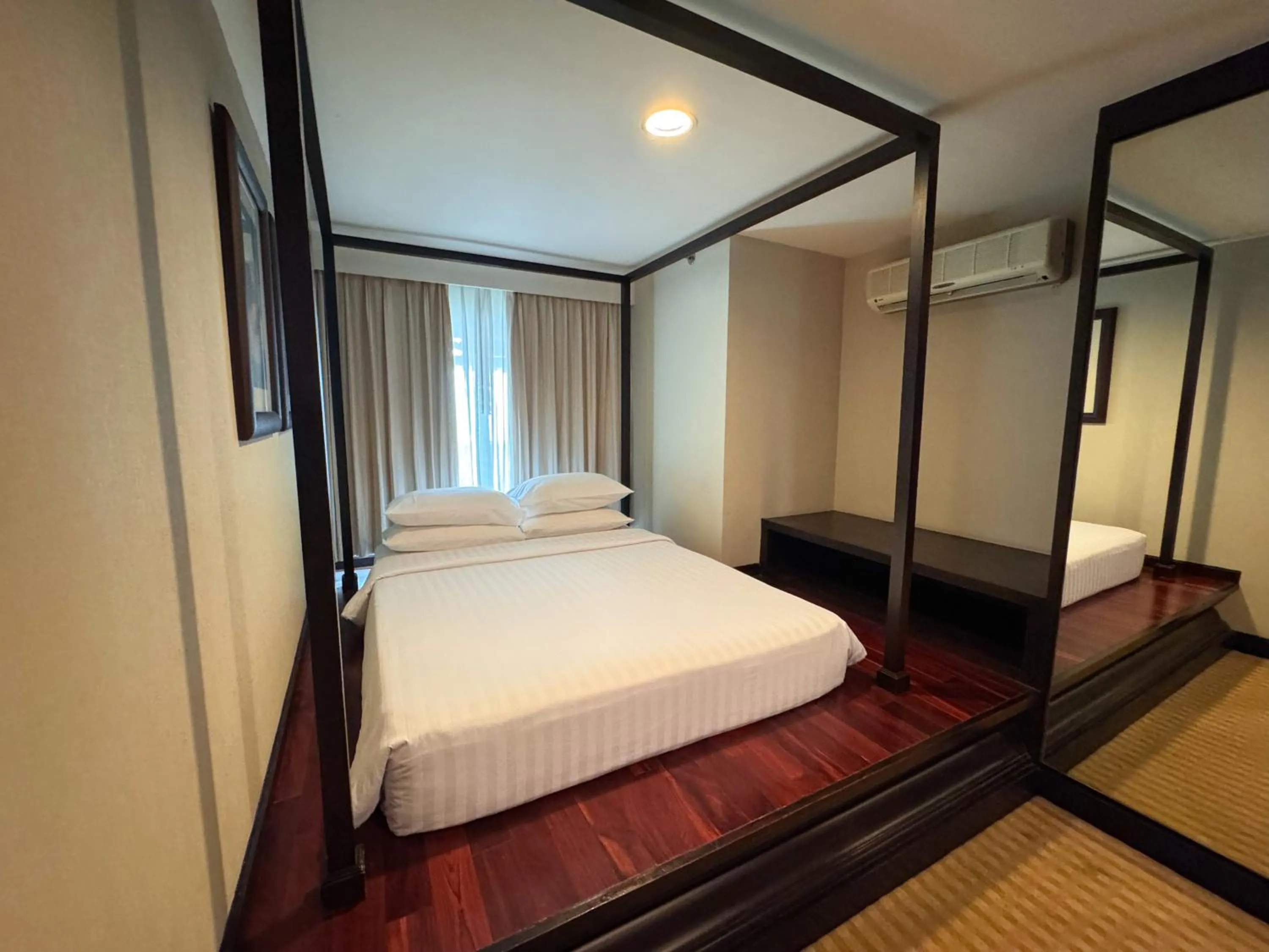 Photo of the whole room, Bed in The Narathiwas Hotel & Residence Sathorn Bangkok