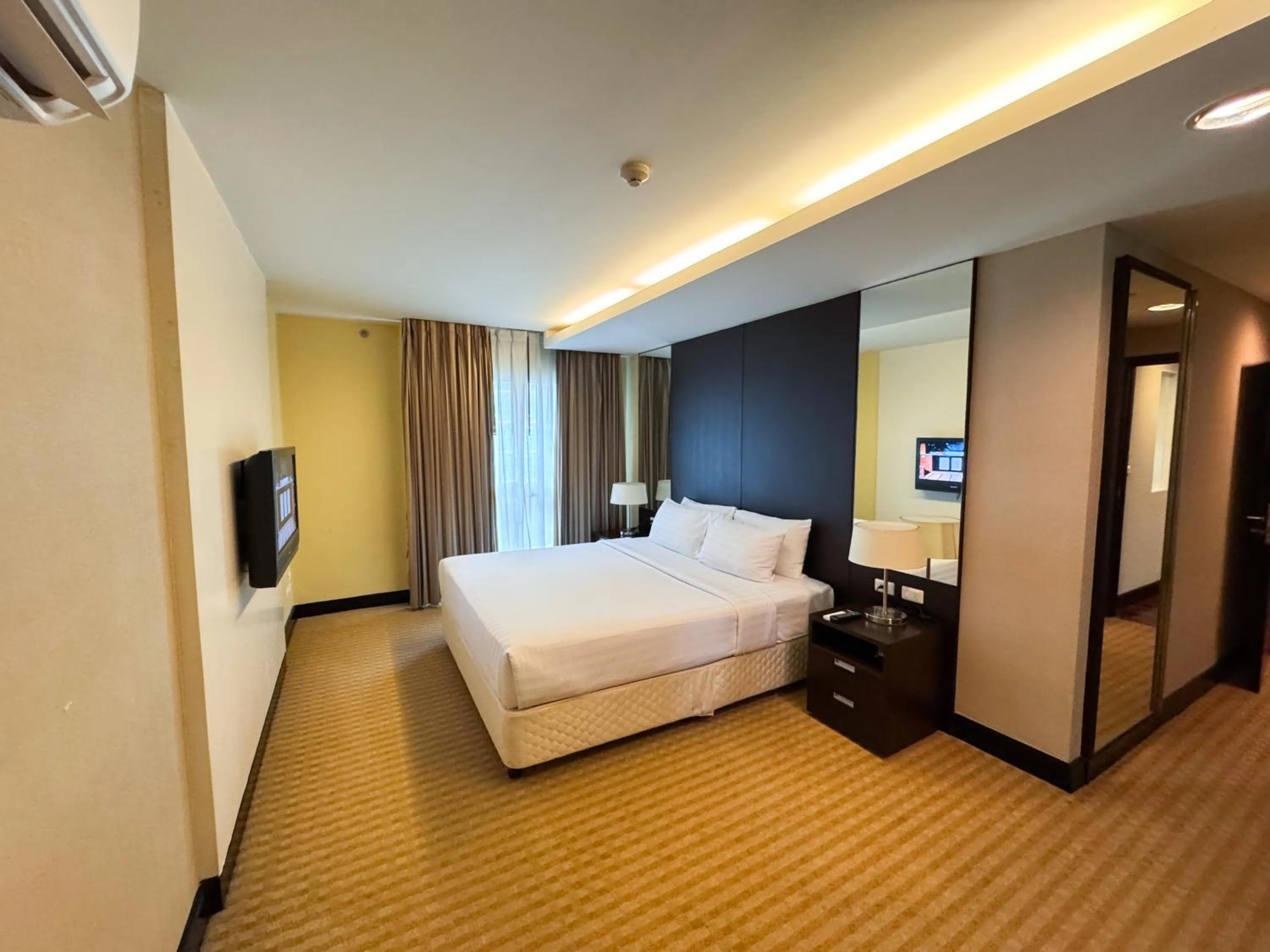 TV and multimedia, Bed in The Narathiwas Hotel & Residence Sathorn Bangkok