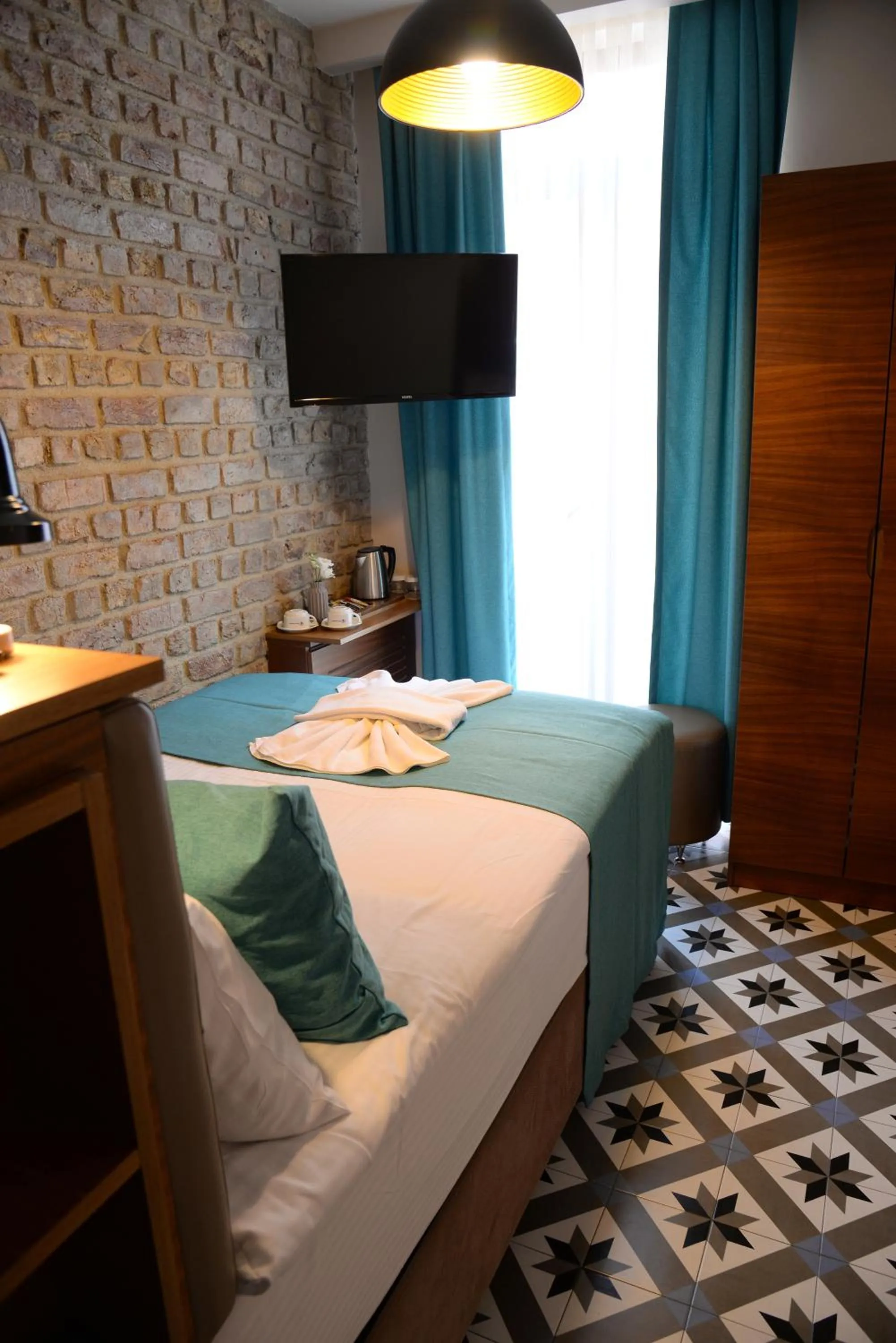 Bed in Pera Luna Residence