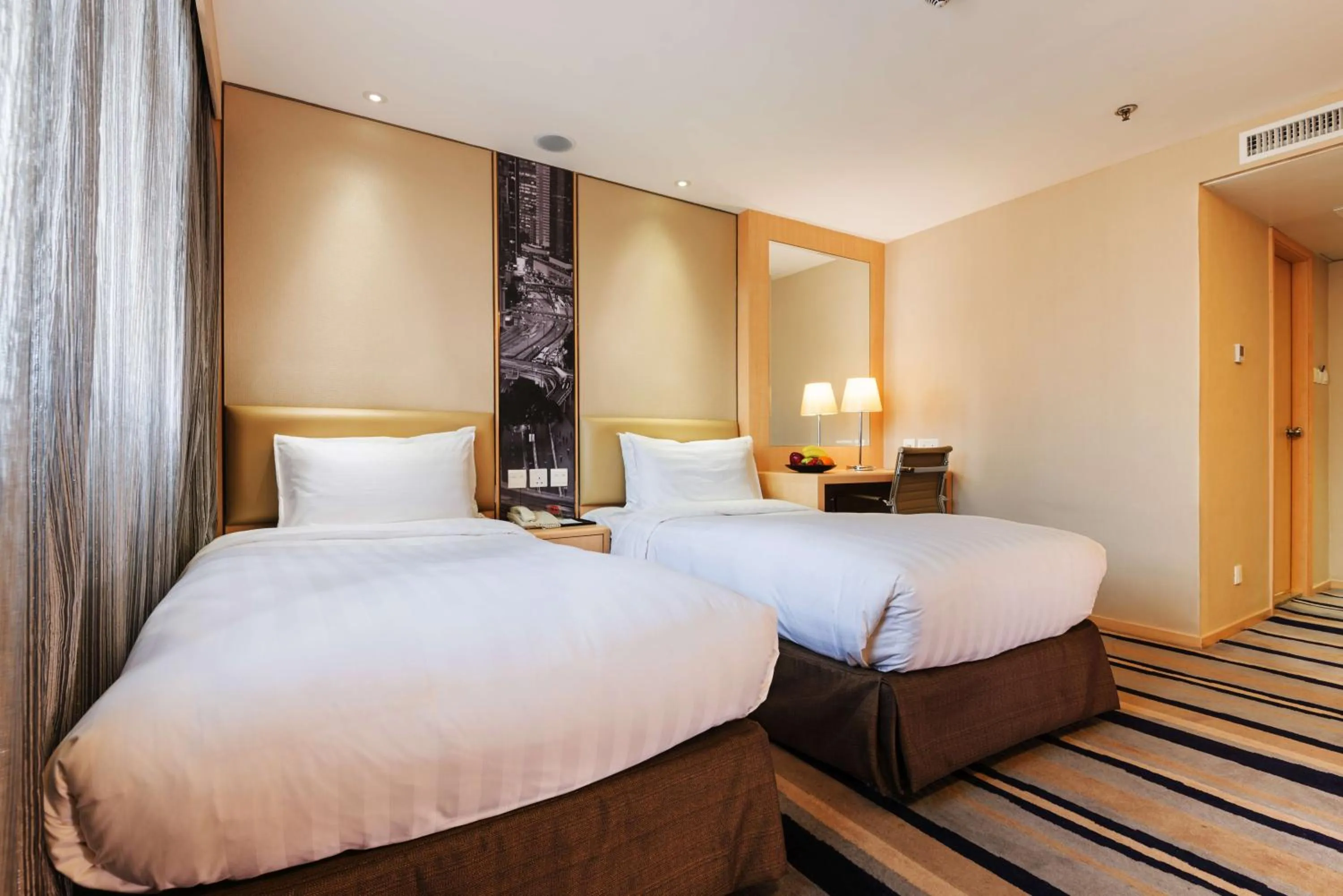 Decorative detail, Bed in Metropark Hotel Mongkok