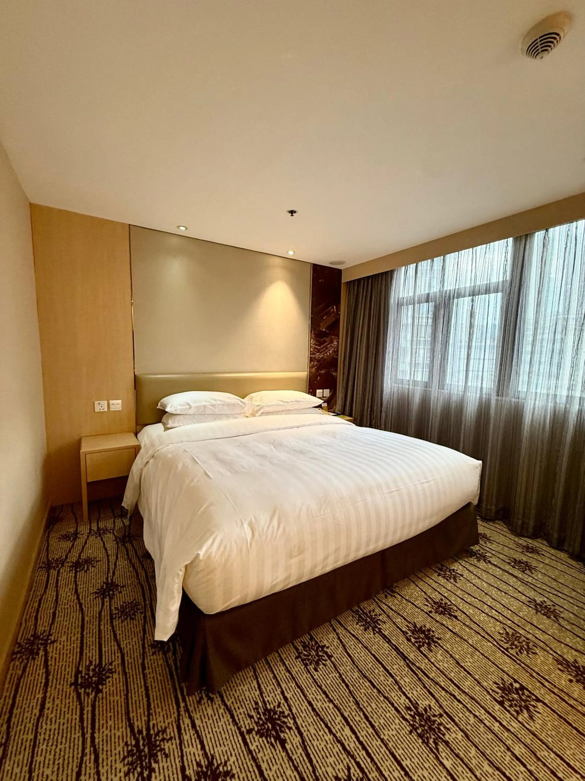 Bed in Metropark Hotel Mongkok