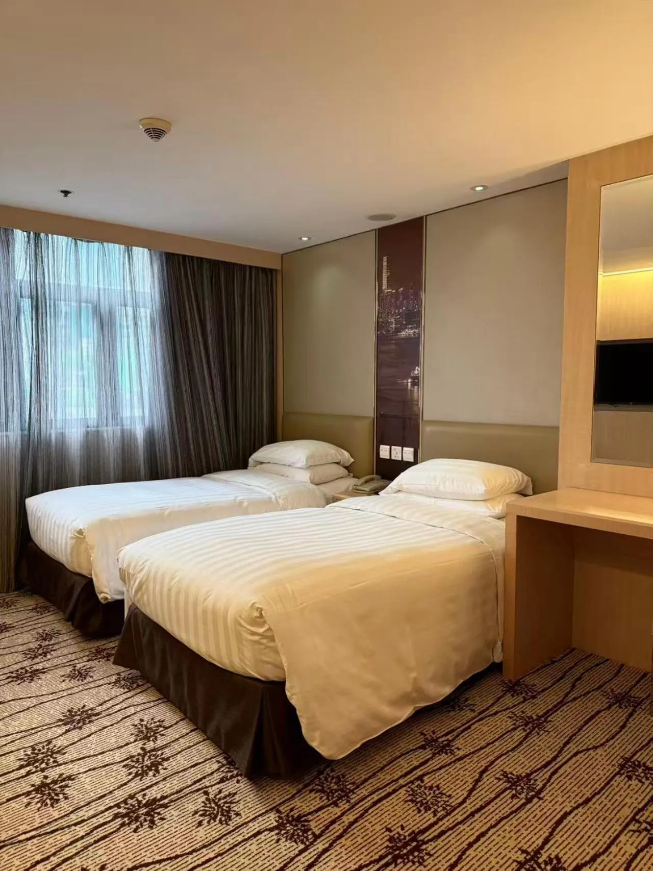 Bed in Metropark Hotel Mongkok