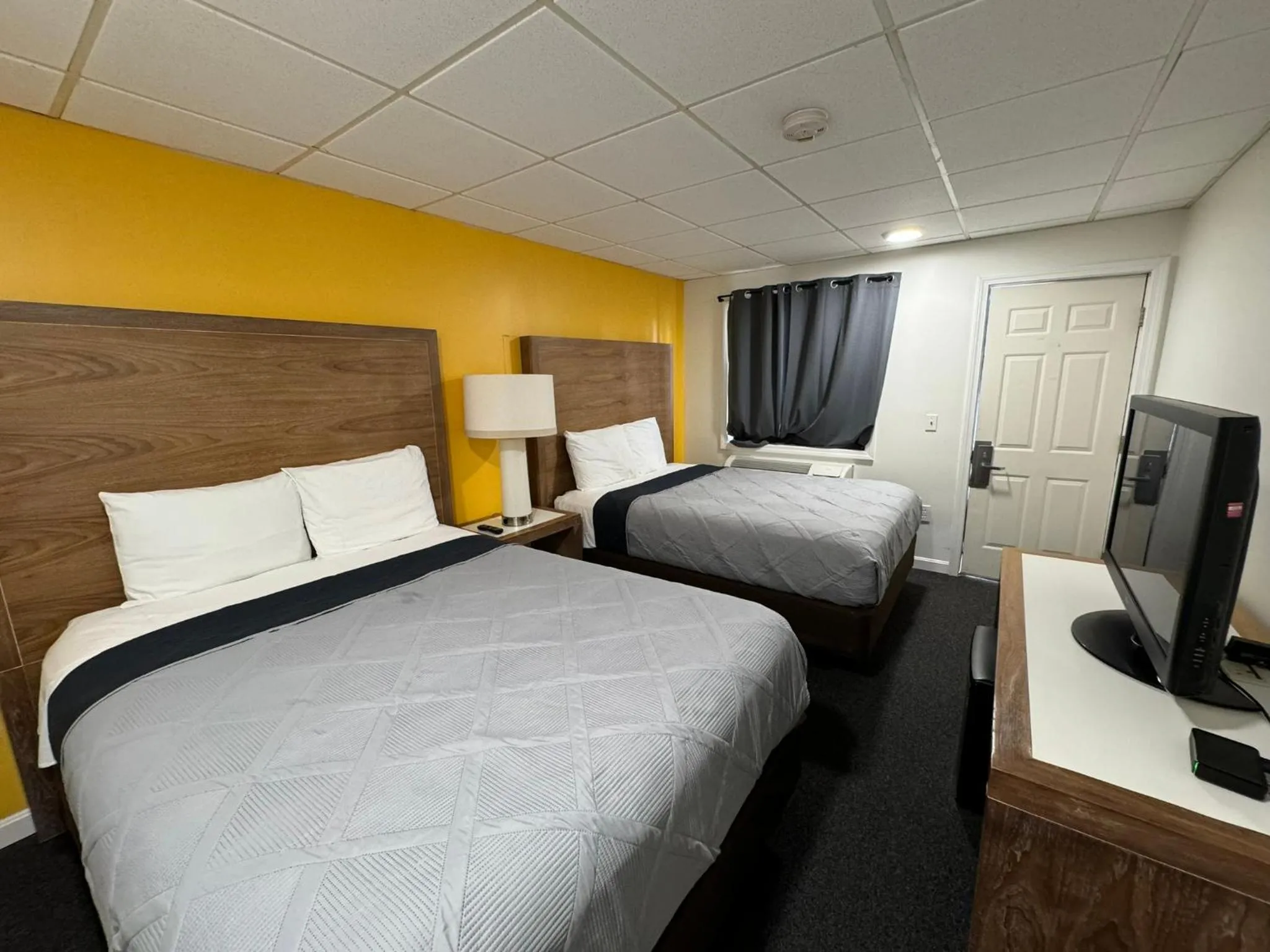 Bed in Winnisquam Lake Inn