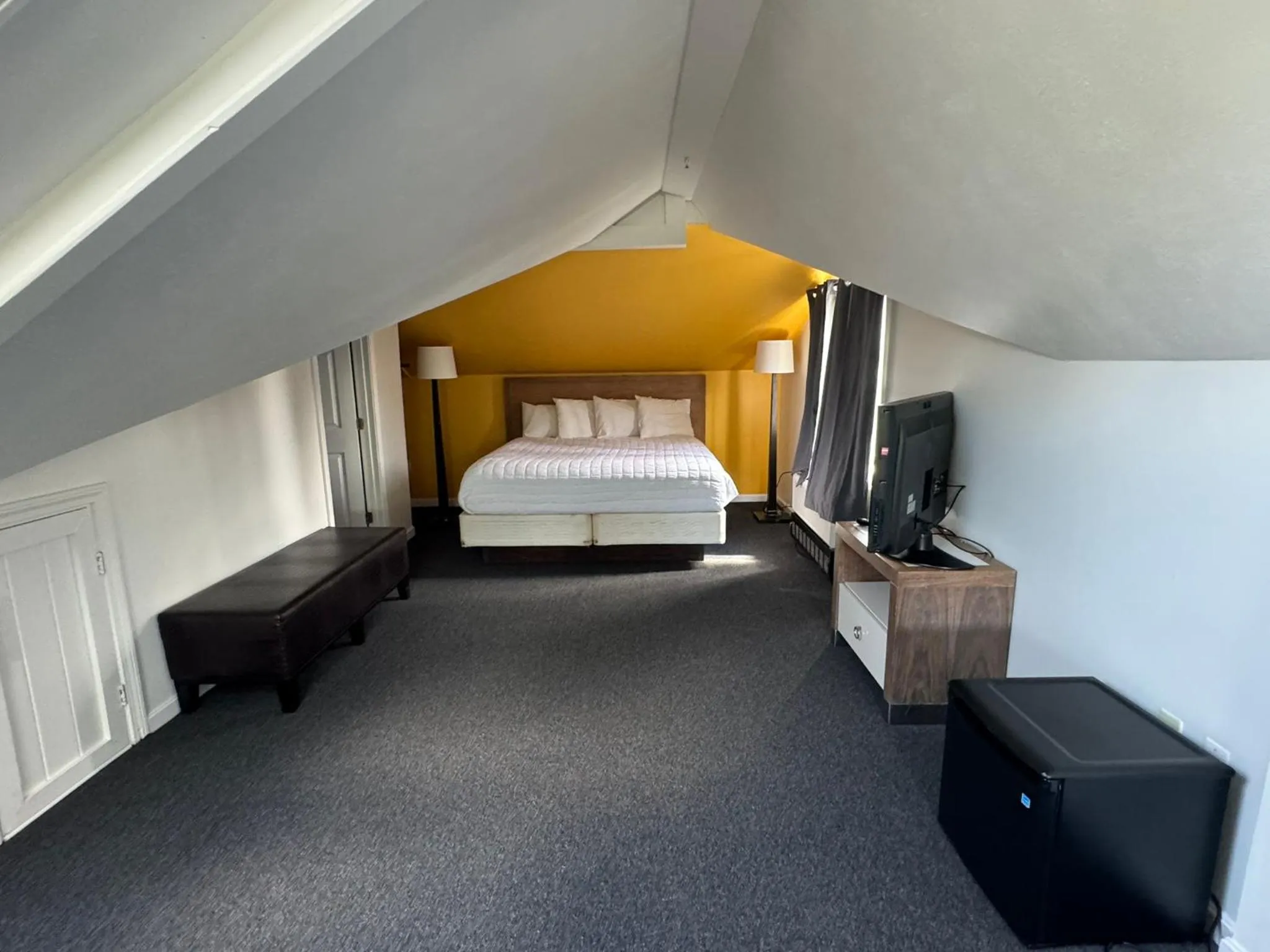 Bed in Winnisquam Lake Inn