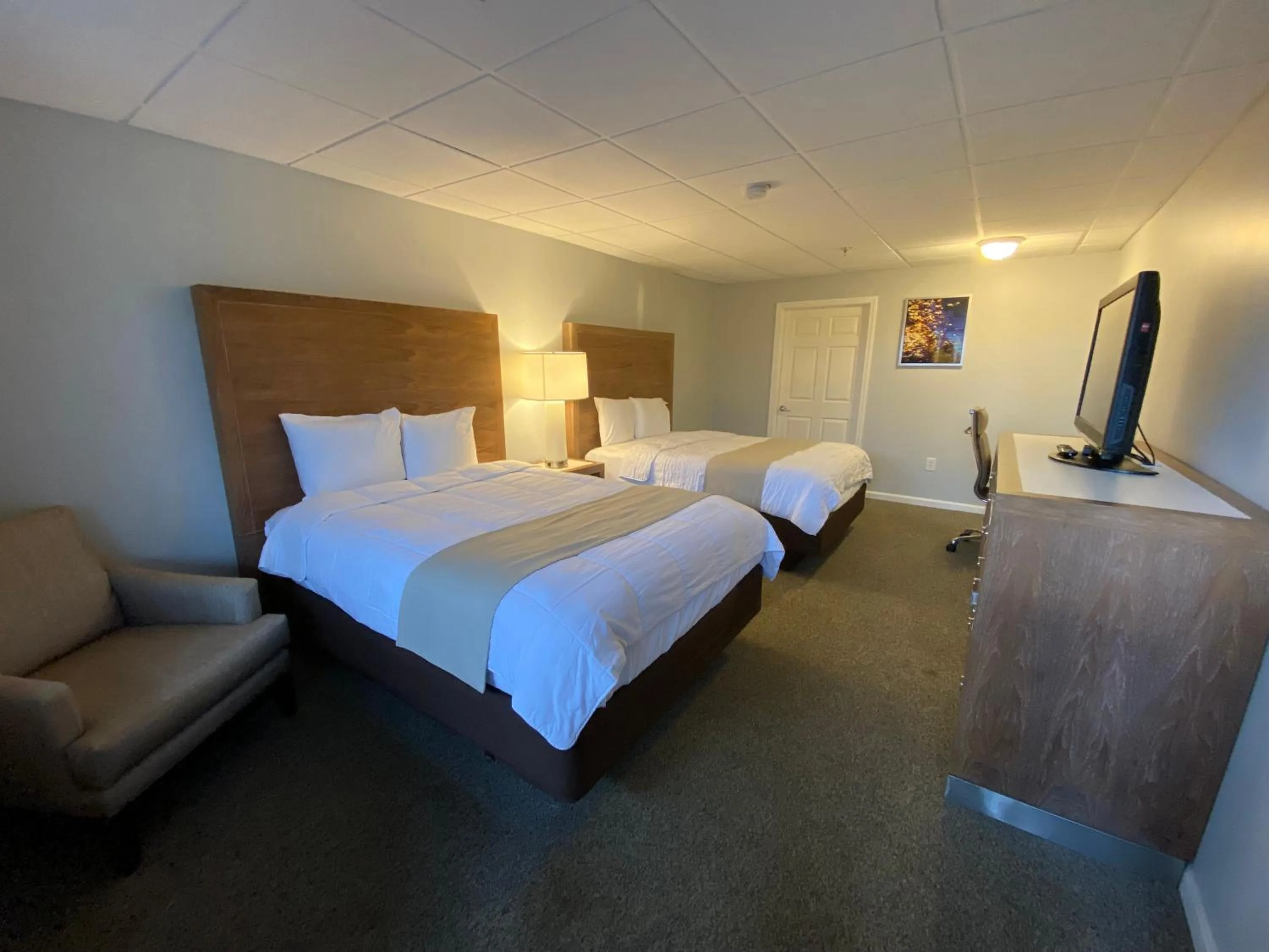 Bed in Winnisquam Lake Inn