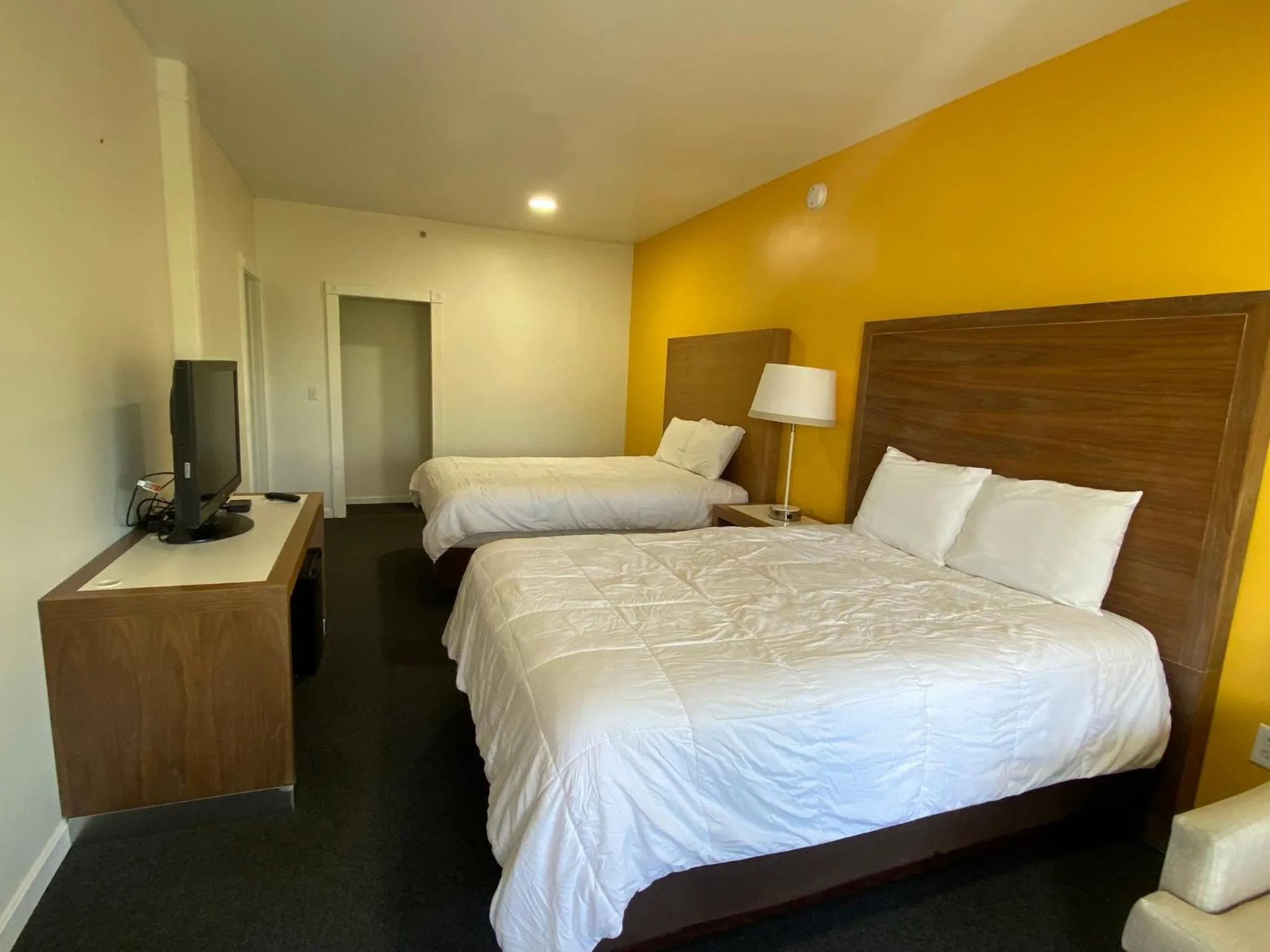 Bed in Winnisquam Lake Inn