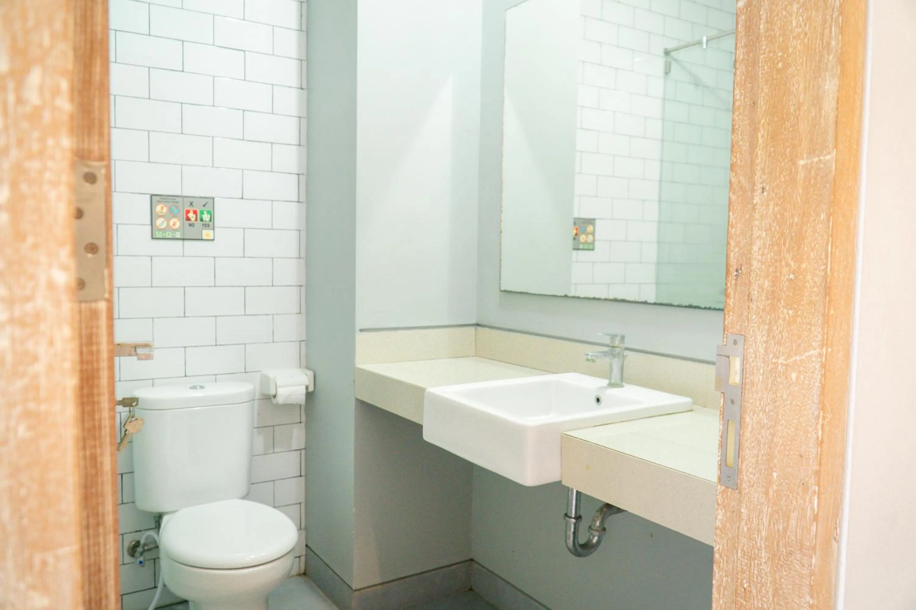 Bathroom in Gemini Star Hotel Kuta