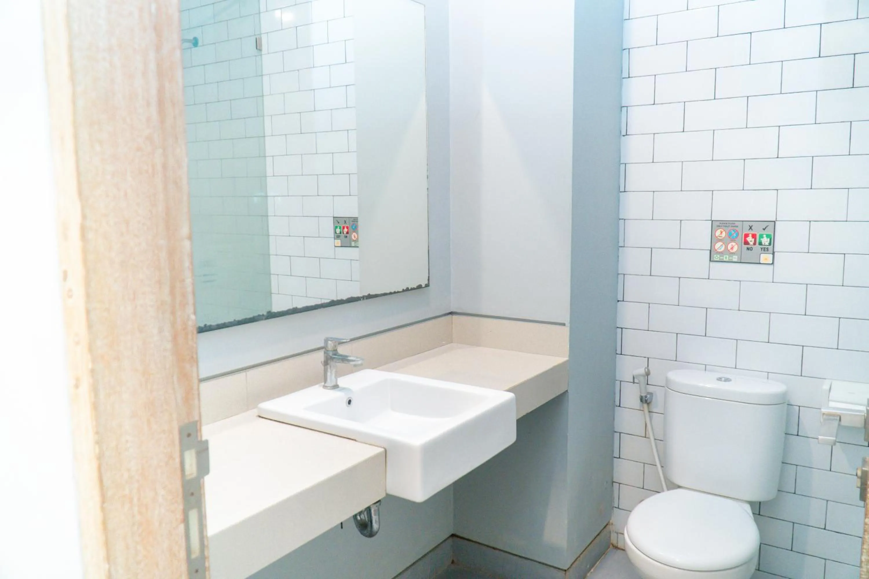 Bathroom in Gemini Star Hotel Kuta