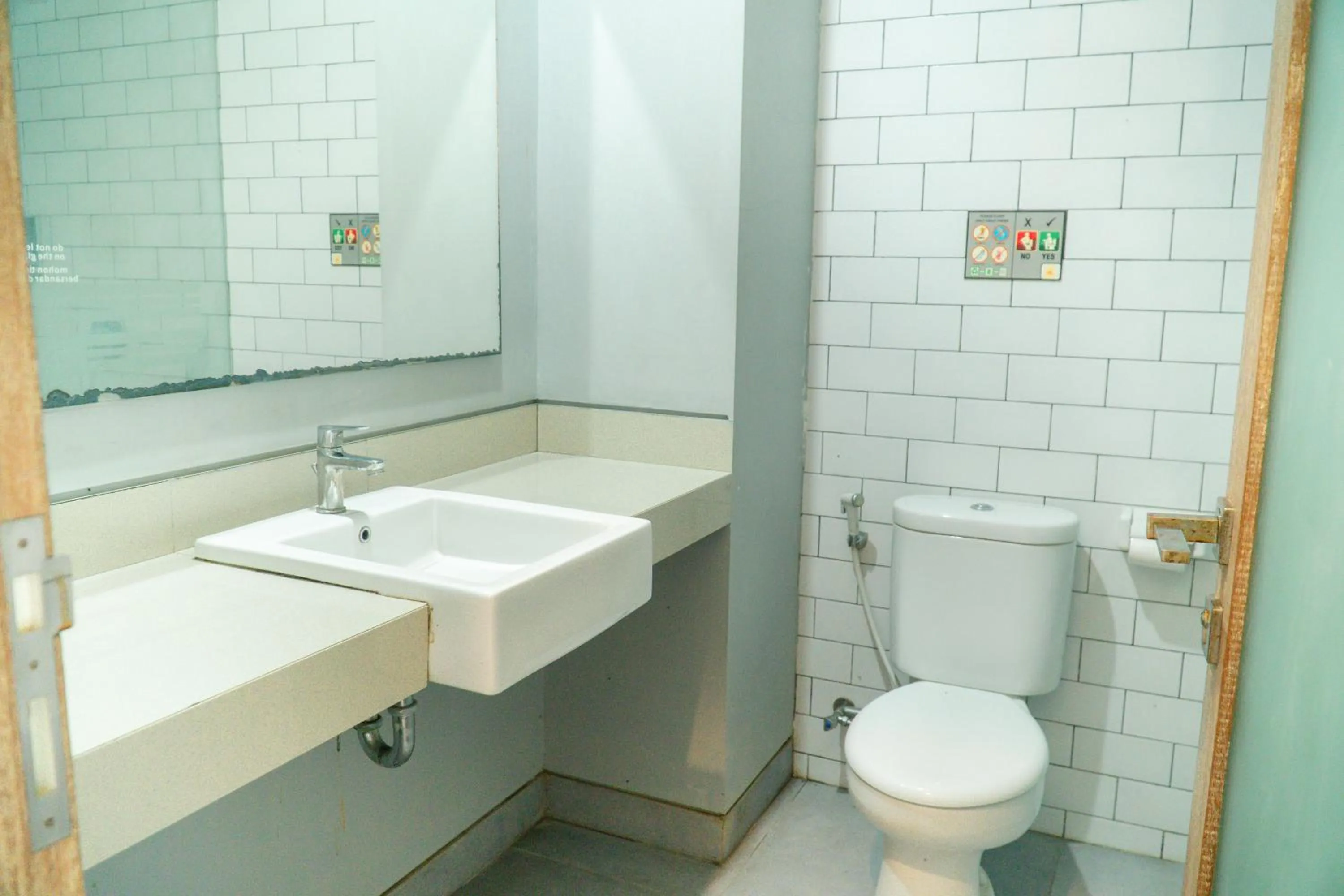 Bathroom in Gemini Star Hotel Kuta