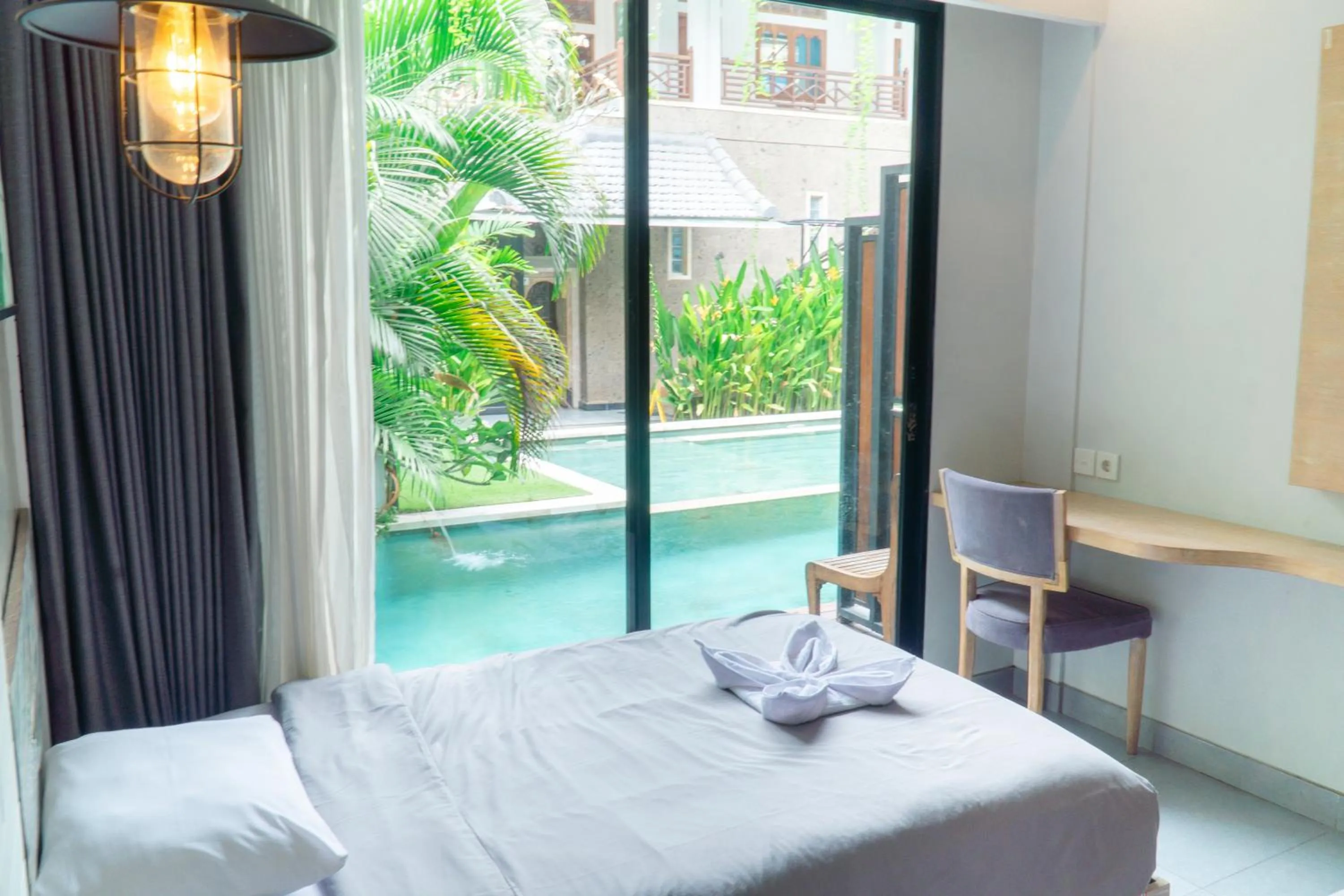 Bed in Gemini Star Hotel Kuta